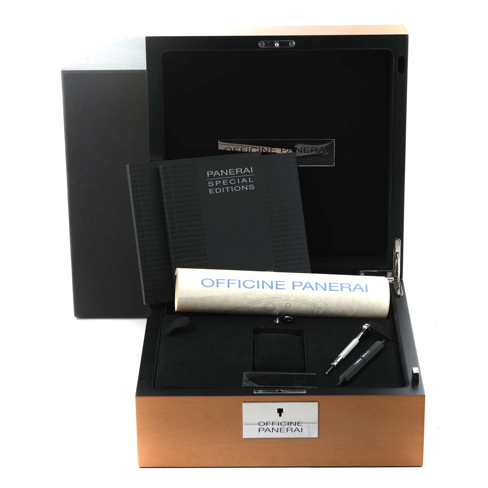 The image shows the open box of a Panerai Submersible PAM00569 Men's Titanium Black Dial PAM00569 Men's Titanium Black Dial watch, containing booklets, tools, and other accessories.