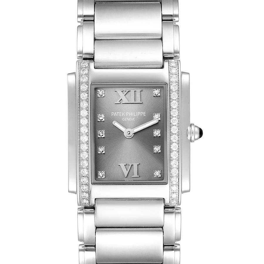 The Patek Philippe Twenty-4 watch is shown from a top-down angle highlighting the face, bracelet, and side crown.