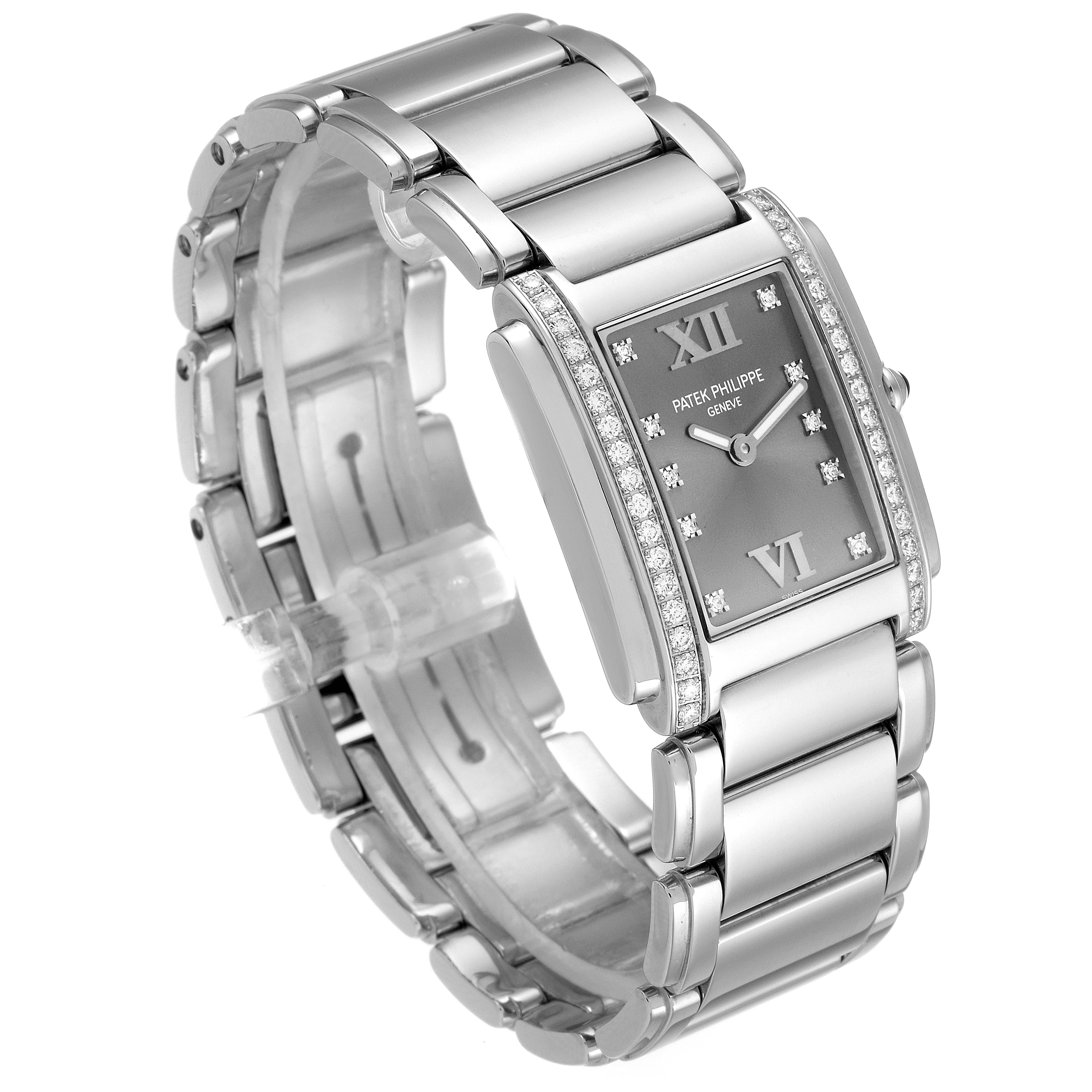 The Patek Philippe Twenty-4 4910/10A-010 Women's Stainless Steel Grey Dial 4910/10A-010 Women's Stainless Steel Grey Dial watch is shown at a three-quarter angle, displaying the dial, case, and bracelet.
