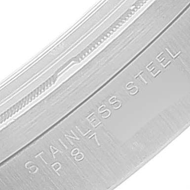 This image shows a close-up of the stainless steel case back of a Rolex Air-King 14010 Men's Stainless Steel White Dial 14010 Men's Stainless Steel White Dial watch with engraved text.