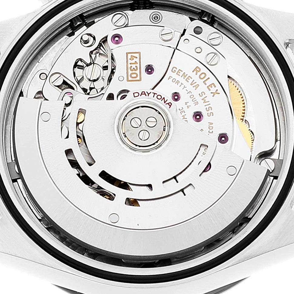 This image shows the movement of a Rolex Daytona 116500 Men's Stainless Steel Black Dial 116500 Men's Stainless Steel Black Dial watch from a rear angle, highlighting the rotor and internal components.