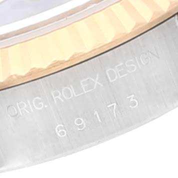 This image shows a close-up of the case side and reference number of a Rolex Datejust 69173 Women's Steel and Gold (two tone) Blue Dial 69173 Women's Steel and Gold (two tone) Blue Dial model.