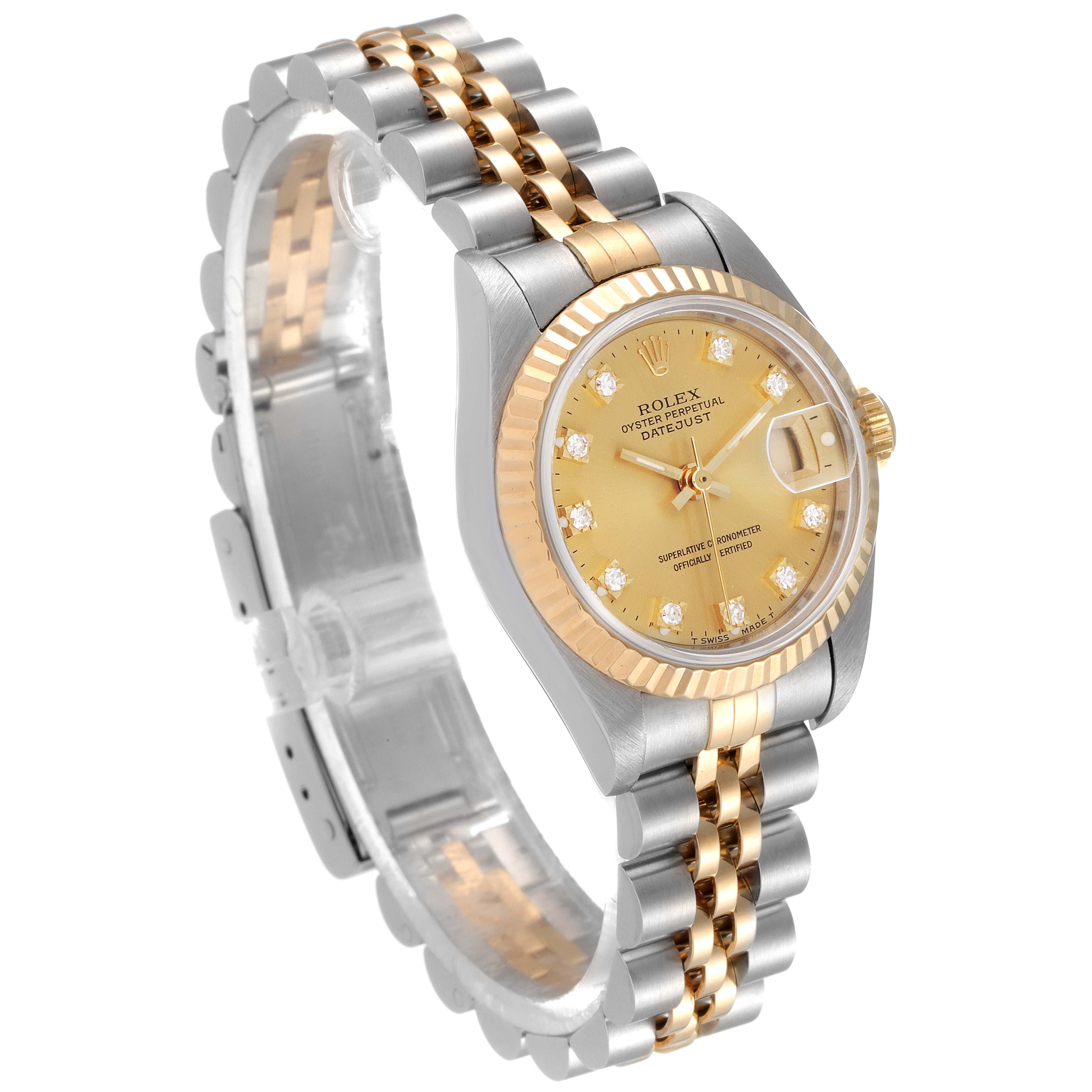 The image shows a Rolex Datejust 69173 Women
s Steel and Gold (two tone) Champagne Dial 69173 Women
s Steel and Gold (two tone) Champagne Dial watch at a three-quarter angle, displaying the face, fluted bezel, and Jubilee bracelet.