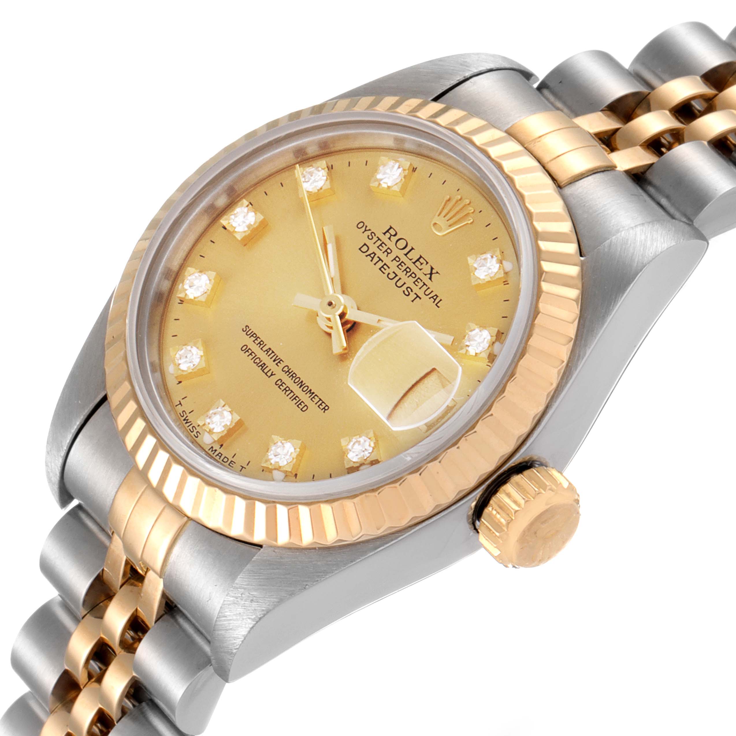 The image shows a close-up angled view of a Rolex Datejust 69173 Women
s Steel and Gold (two tone) Champagne Dial 69173 Women
s Steel and Gold (two tone) Champagne Dial watch, highlighting its dial, bezel, crown, and part of the bracelet.