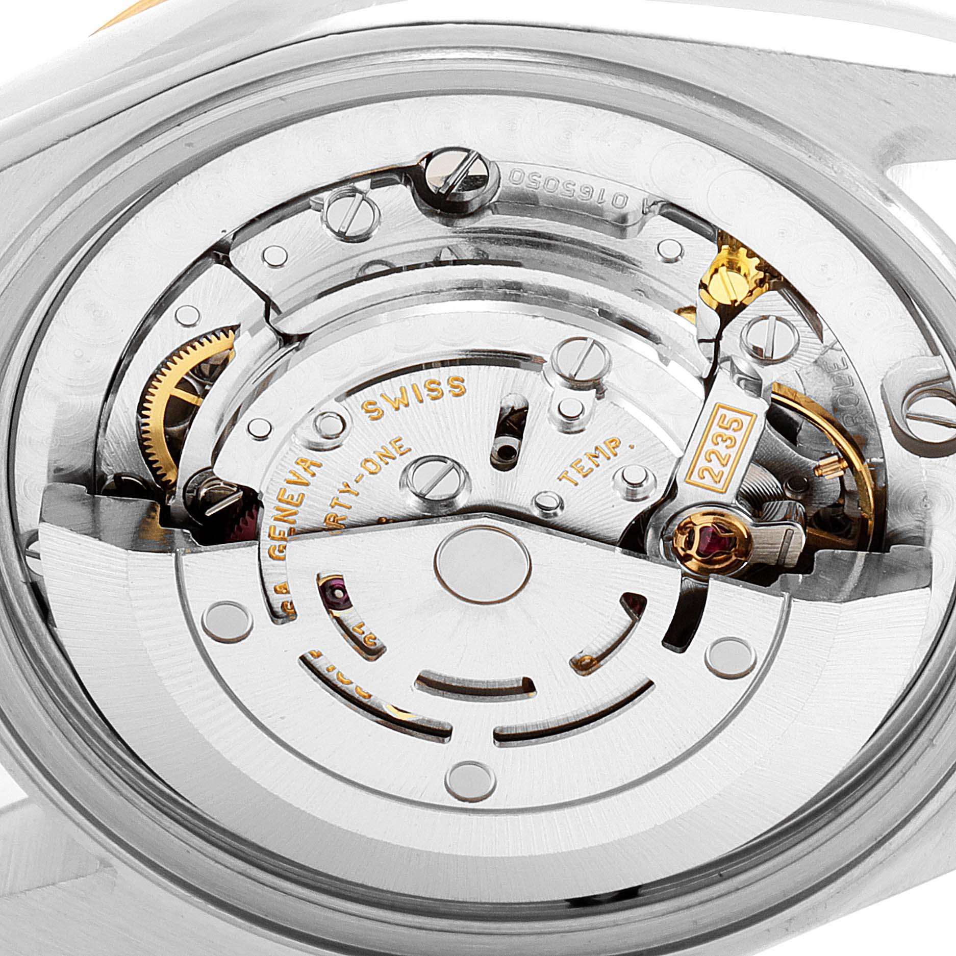 This image shows a close-up view of the movement mechanism inside a Mid-Size Rolex watch.