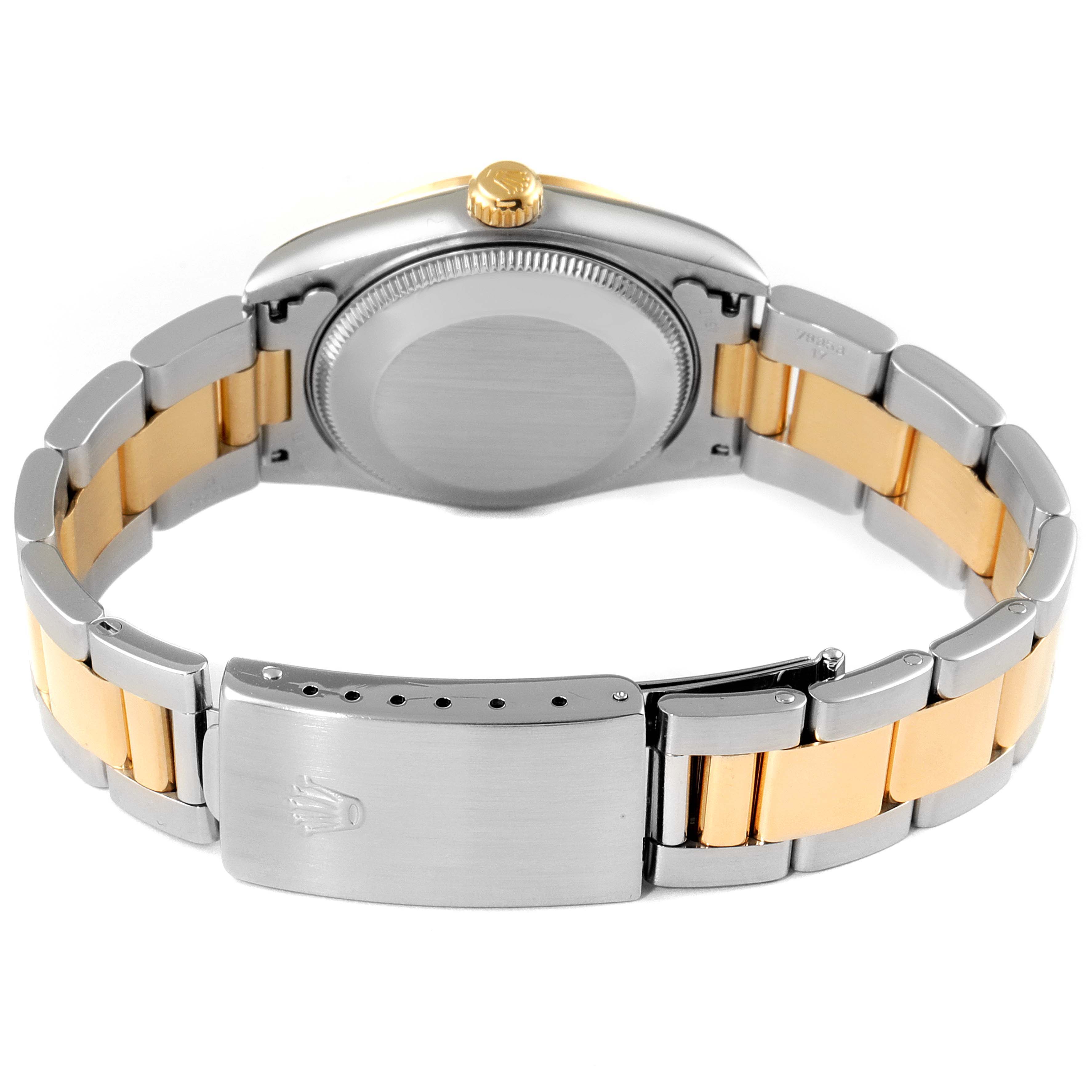 This image shows the back of the Rolex Mid-Size 78243 Women's Steel and Gold (two tone) Mother of Pearl Dial 78243 Women's Steel and Gold (two tone) Mother of Pearl Dial watch, highlighting the two-tone bracelet and the clasp.