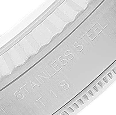 This image shows a close-up of the bezel and case side of a Rolex Datejust 16234 Men's Stainless Steel Blue Dial 16234 Men's Stainless Steel Blue Dial watch, highlighting "STAINLESS STEEL" engraved text.