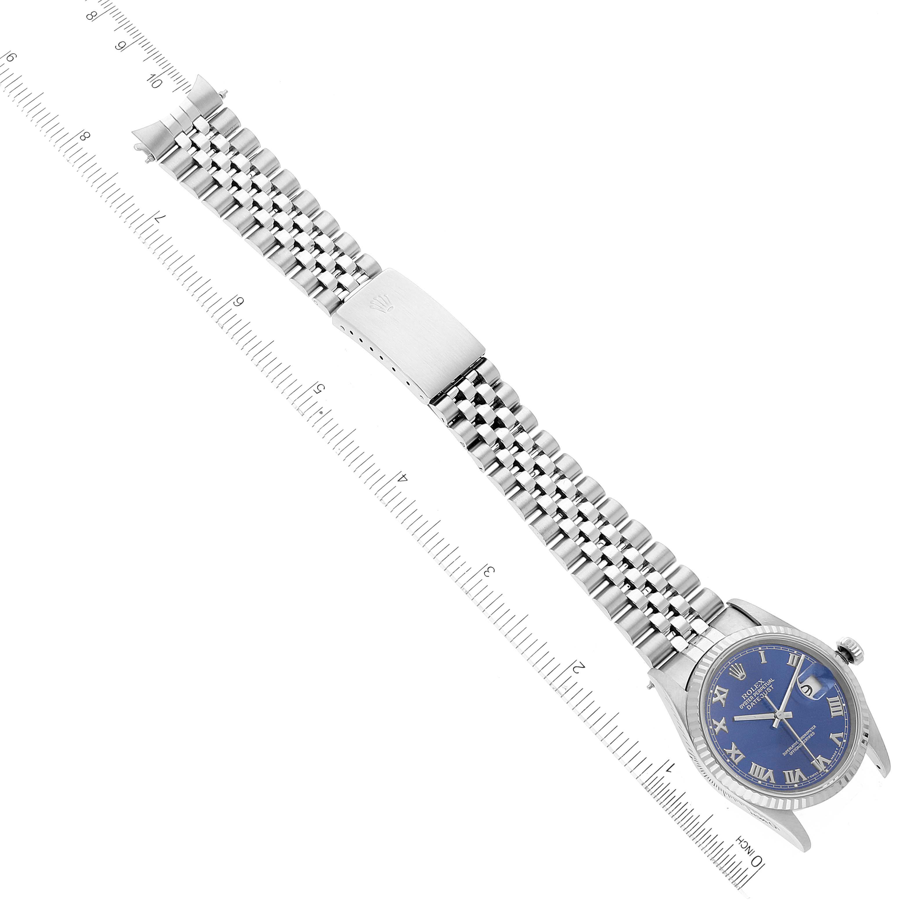 The image shows a Rolex Datejust 16234 Men's Stainless Steel Blue Dial 16234 Men's Stainless Steel Blue Dial watch with a blue dial and stainless steel jubilee bracelet, displayed from a top-down angle.