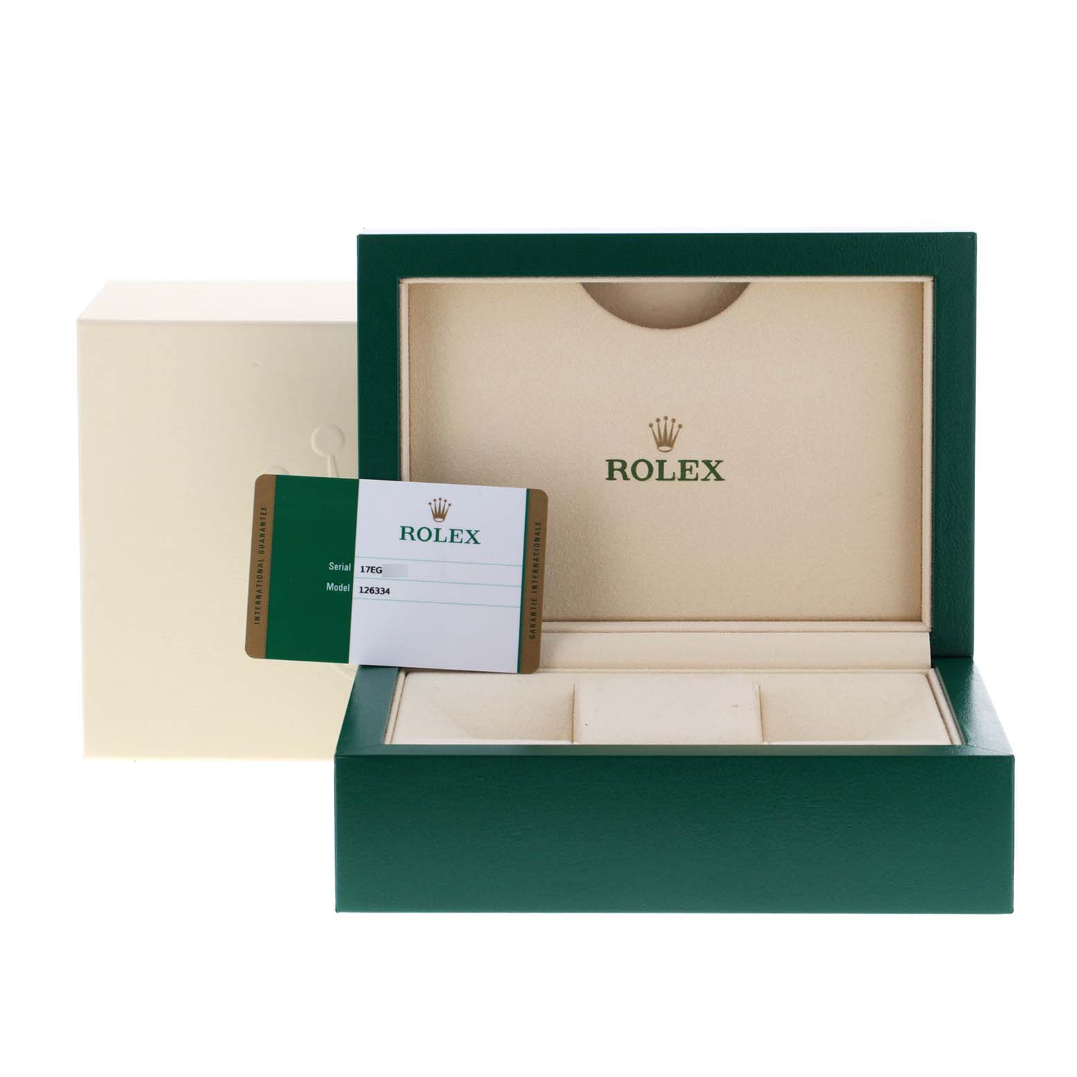 The image shows the box and warranty card for a Rolex Datejust 41 126334 Men
s Stainless Steel Silver Dial 126334 Men
s Stainless Steel Silver Dial model.
