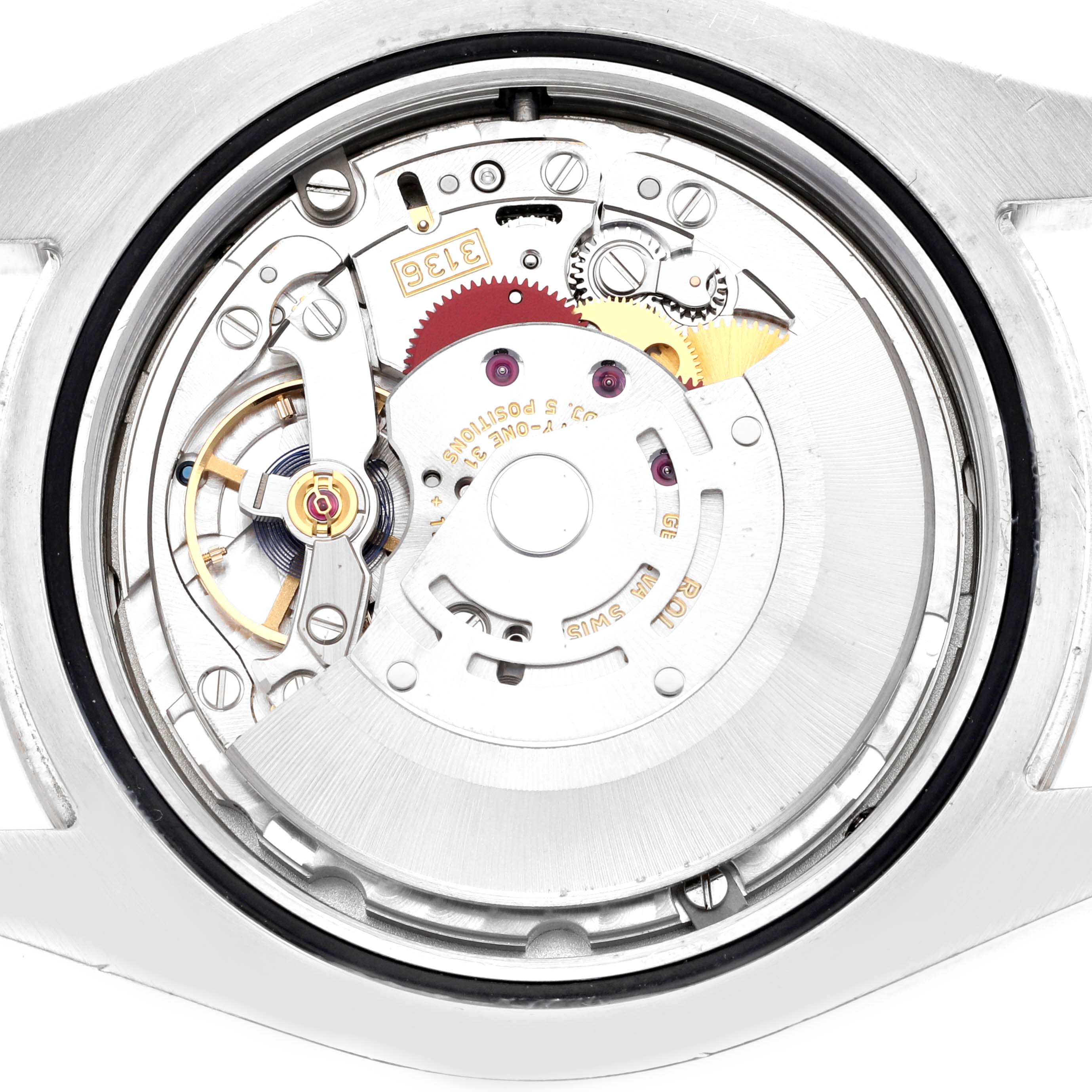 The image shows a close-up of the movement mechanism inside a Rolex Datejust 41 116334 Men
s Stainless Steel Blue Dial 116334 Men
s Stainless Steel Blue Dial watch, viewed from the back case.