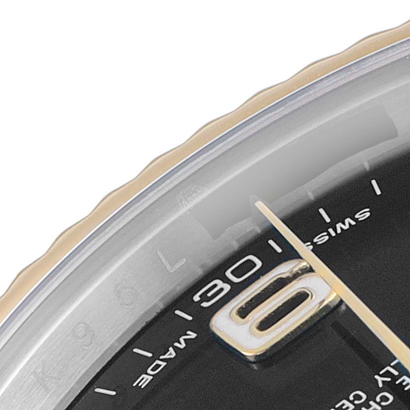The image shows a close-up of the dial and bezel of a Rolex Datejust 41 116333 Men's Steel and Gold (two tone) Black Dial 116333 Men's Steel and Gold (two tone) Black Dial, focusing on the "SWISS MADE" label and the number 30.