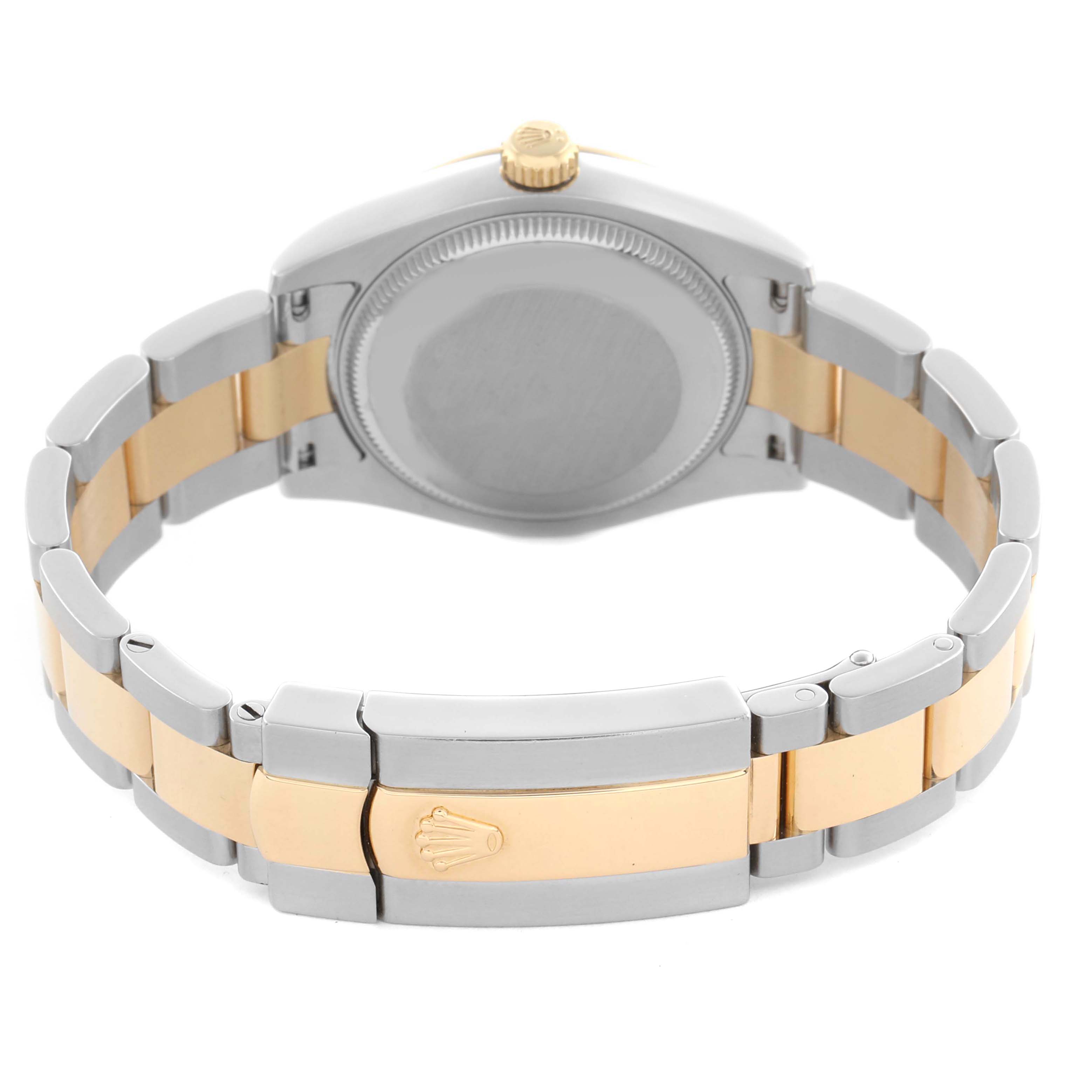 The image shows the back view of a Rolex Mid-Size 178273 Women's Steel and Gold (two tone) Champagne Dial 178273 Women's Steel and Gold (two tone) Champagne Dial watch, highlighting its clasp and two-tone bracelet.