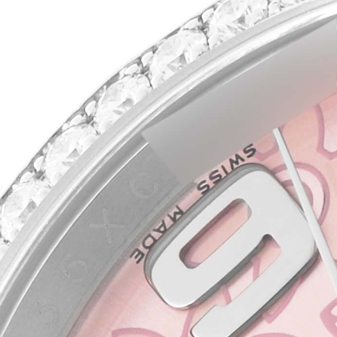 The image shows a close-up of the bezel and a part of the dial of a Rolex Datejust 116244 Women's Stainless Steel Pink Dial 116244 Women's Stainless Steel Pink Dial watch, highlighting the "Swiss Made" marking and diamond details.