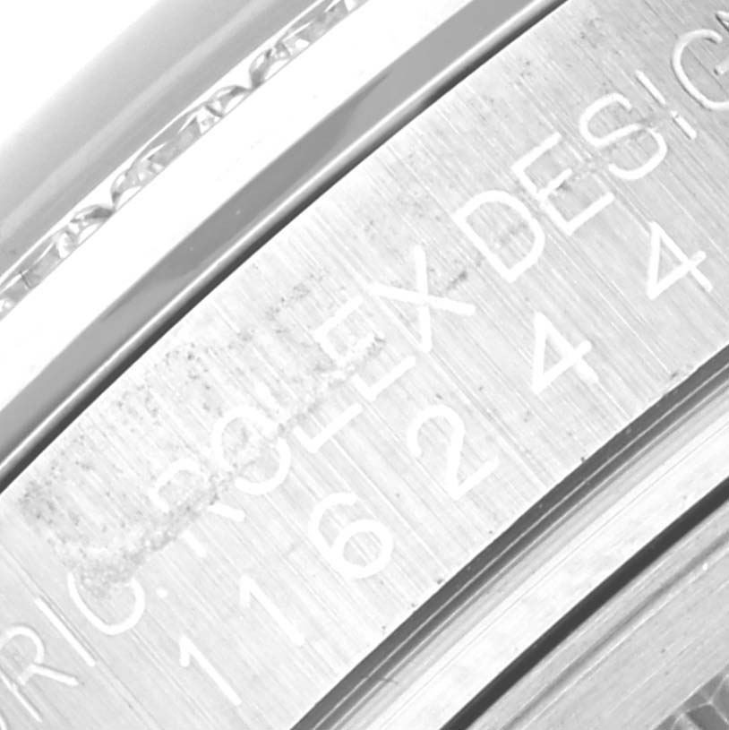 Close-up of the inner bezel and model number engraving on a Rolex Datejust 116244 Women's Stainless Steel Pink Dial 116244 Women's Stainless Steel Pink Dial.