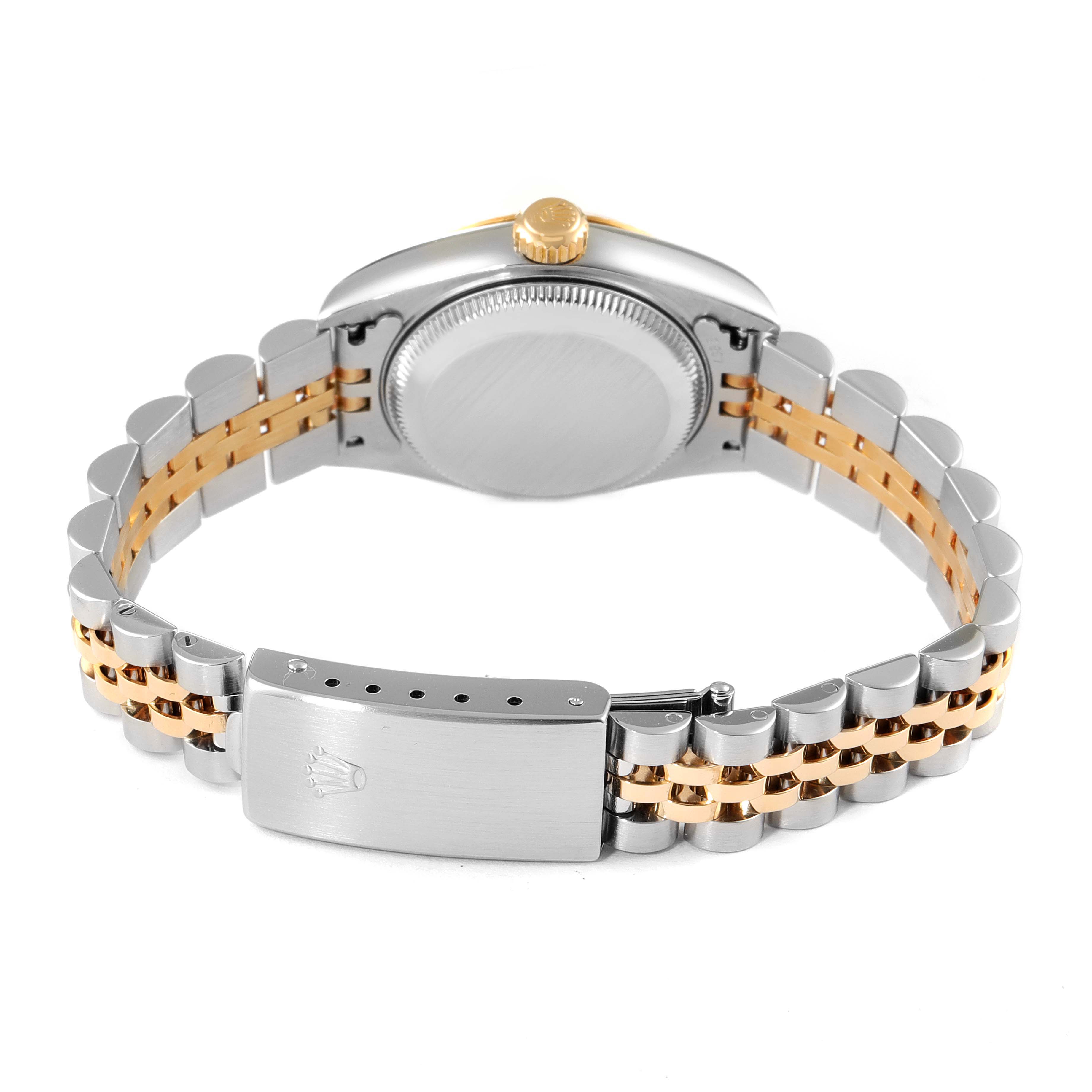 The image shows the back view of a Rolex Datejust 79173 Women
s Steel and Gold (two tone) Black Dial 79173 Women
s Steel and Gold (two tone) Black Dial watch, highlighting the case back and two-tone bracelet with the clasp.