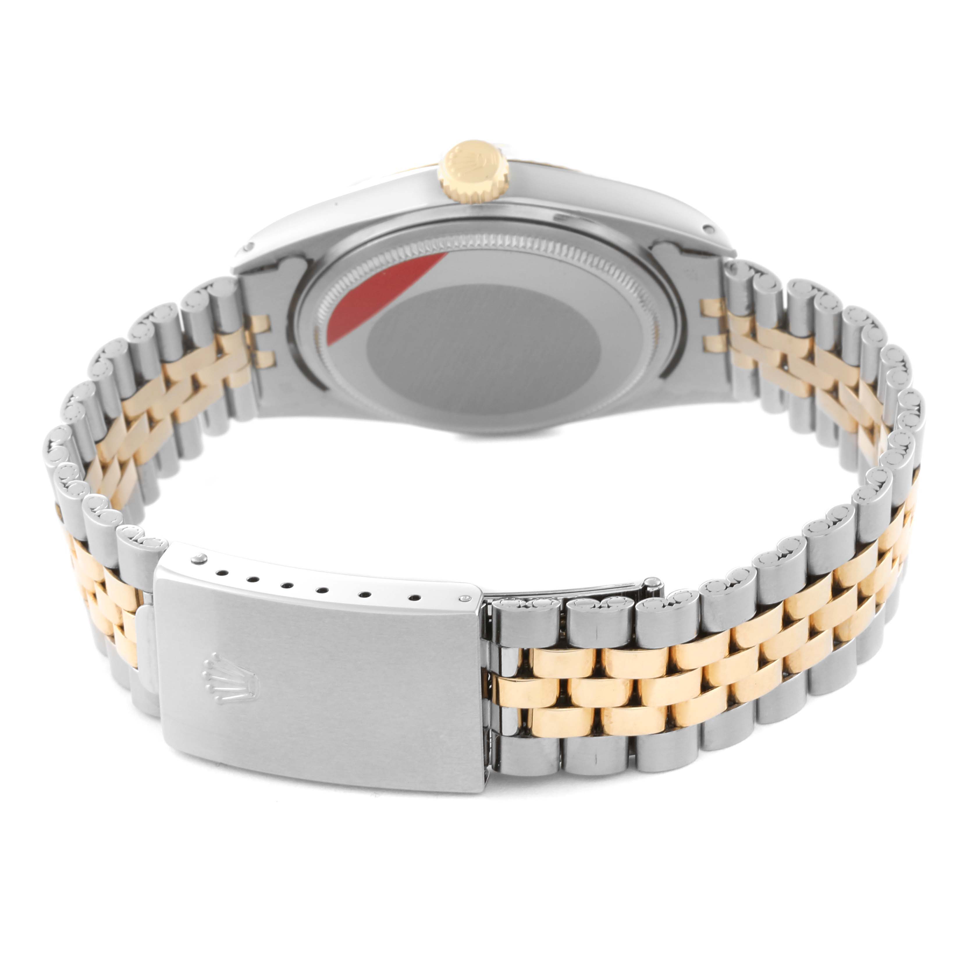 This image shows the back view of a Rolex Vintage Collection 16013 Men's Steel and Gold (two tone) Champagne Dial 16013 Men's Steel and Gold (two tone) Champagne Dial watch, highlighting its two-tone bracelet and clasp.