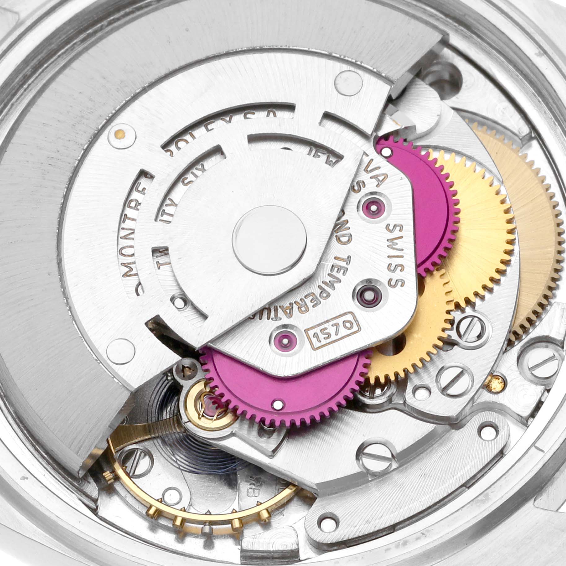 The image shows a close-up view of the internal movement and gears of a Rolex Vintage Collection 16013 Men's Steel and Gold (two tone) Champagne Dial 16013 Men's Steel and Gold (two tone) Champagne Dial model watch.