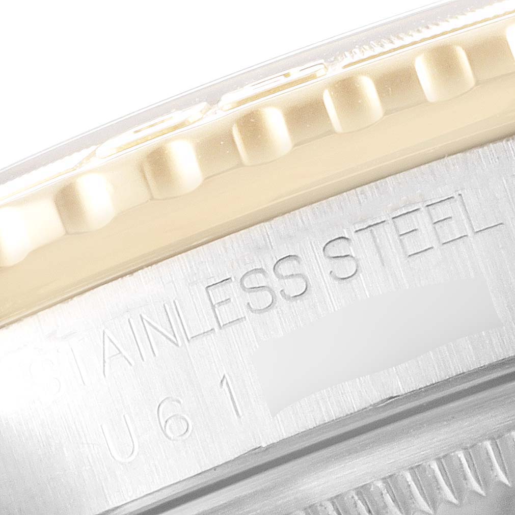The image shows a close-up angle of the edge of the bezel and the stainless steel casing of a Rolex Turn-o-Graph 16263 Men
s Steel and Gold (two tone) Champagne Dial 16263 Men
s Steel and Gold (two tone) Champagne Dial watch.