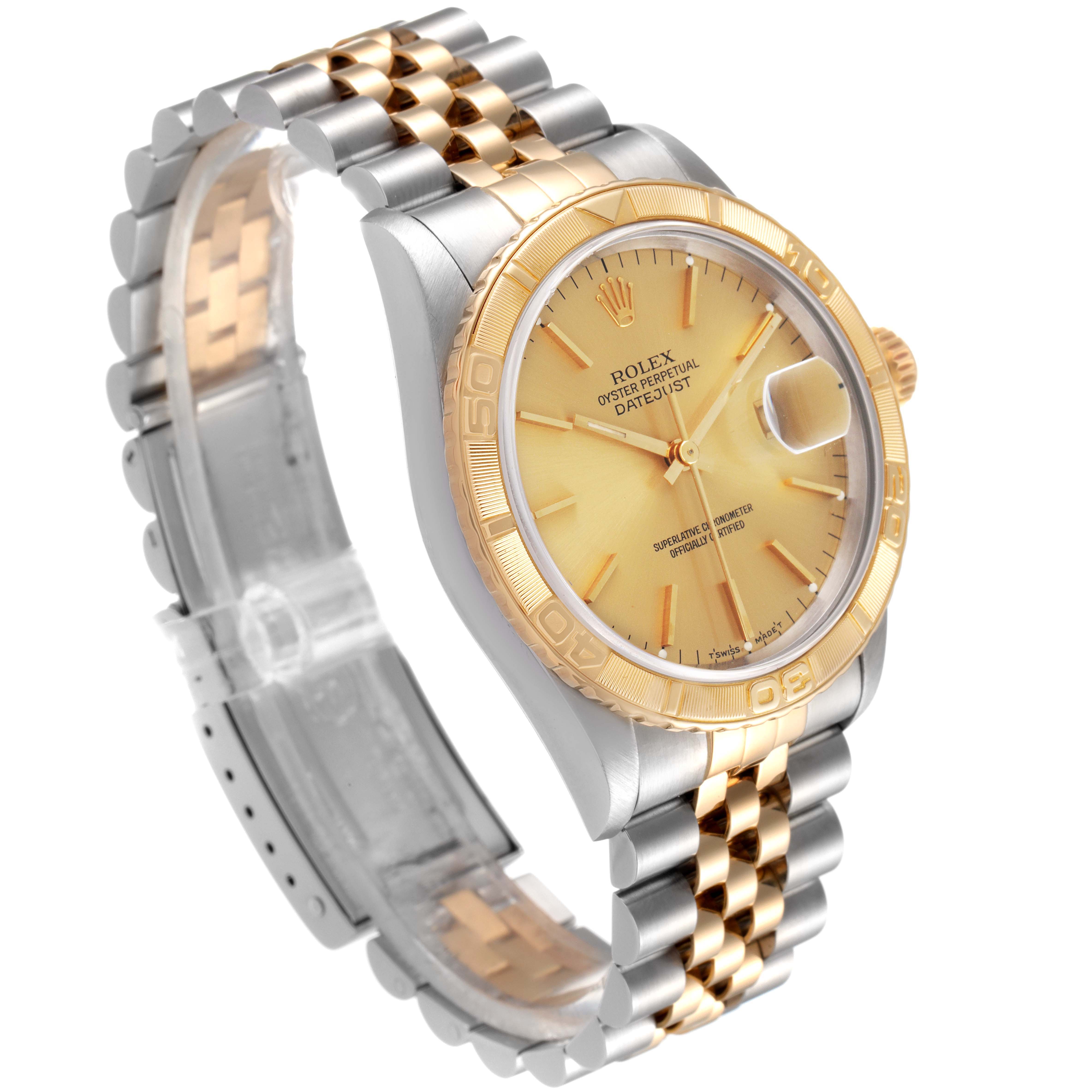 The image shows a Rolex Turn-o-Graph 16263 Men
s Steel and Gold (two tone) Champagne Dial 16263 Men
s Steel and Gold (two tone) Champagne Dial watch at a three-quarter angle, highlighting the face, dial, bezel, and two-tone bracelet.