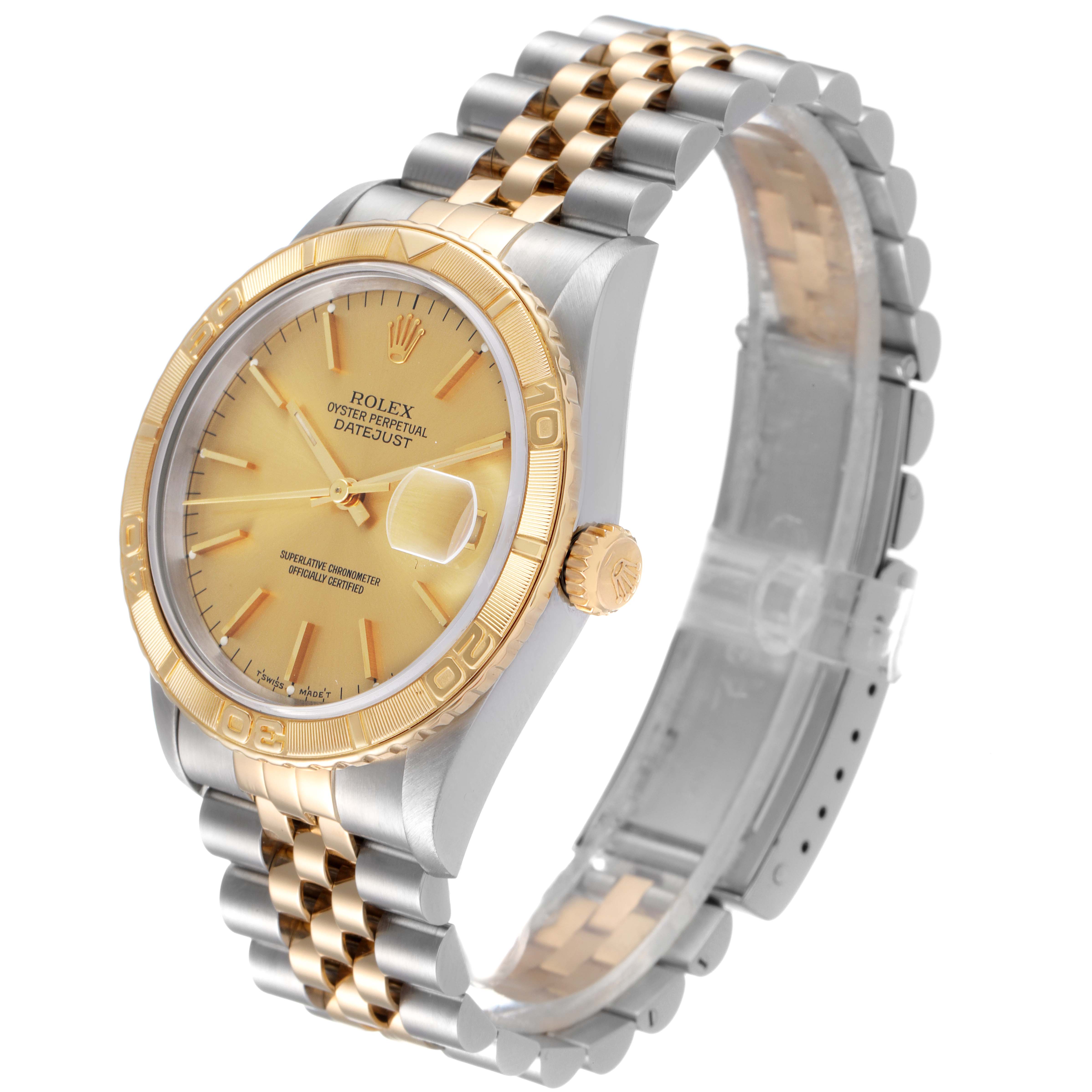 The image shows a three-quarter view of the Rolex Turn-o-Graph 16263 Men
s Steel and Gold (two tone) Champagne Dial 16263 Men
s Steel and Gold (two tone) Champagne Dial watch, highlighting its gold bezel, dial, and two-tone bracelet.
