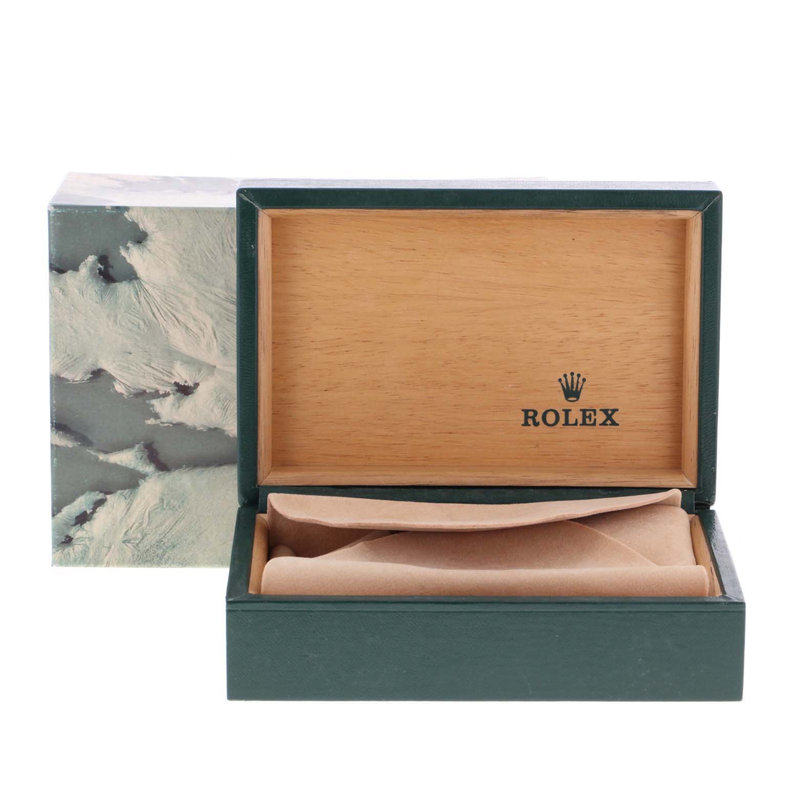 This image shows an open Rolex watch box for the Turn-o-Graph model, with packaging materials inside.