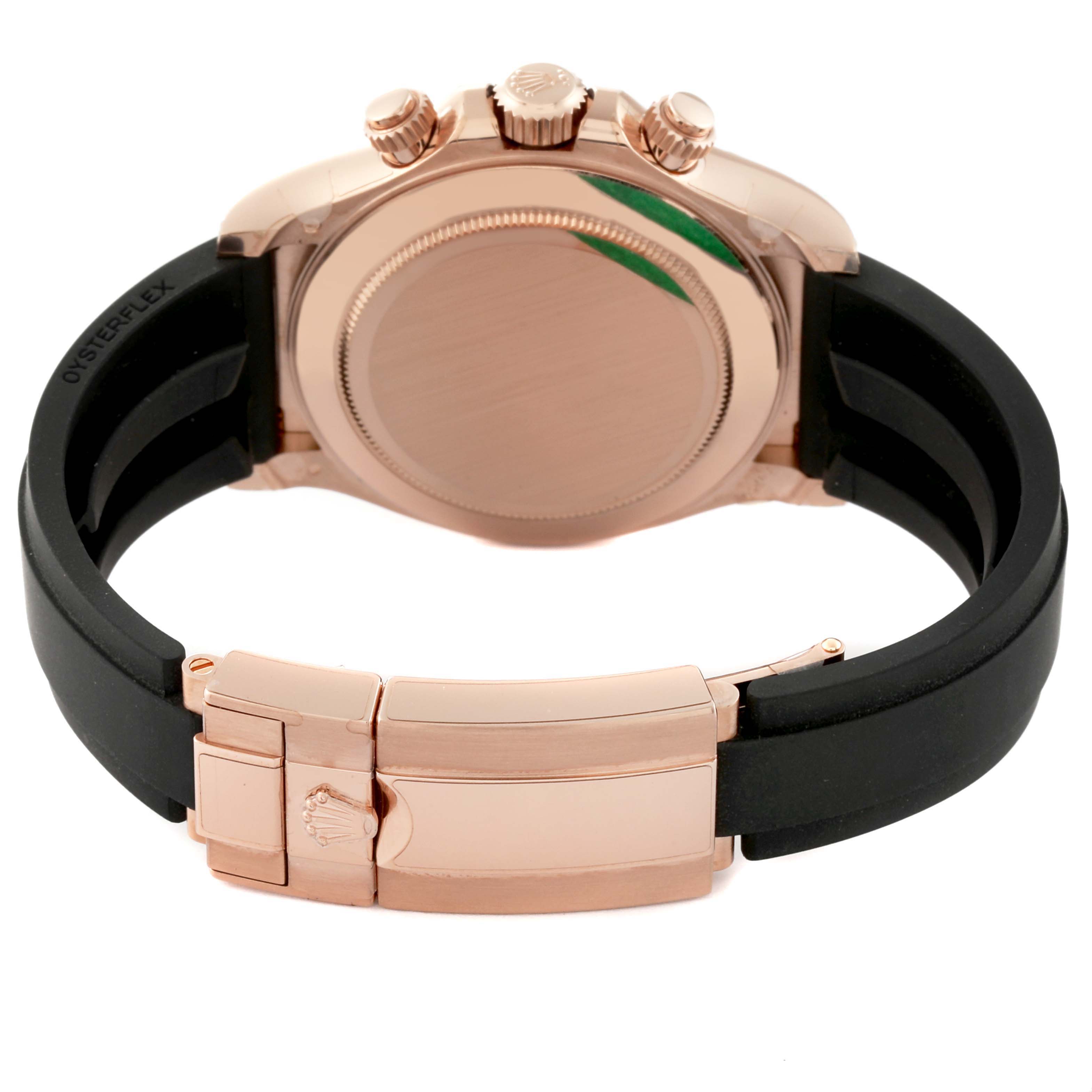 The image shows the back of the Rolex Daytona 116515 Men's Rose Gold Black Dial 116515 Men's Rose Gold Black Dial watch, highlighting its rose gold case, crown, pushers, and Oysterflex strap.