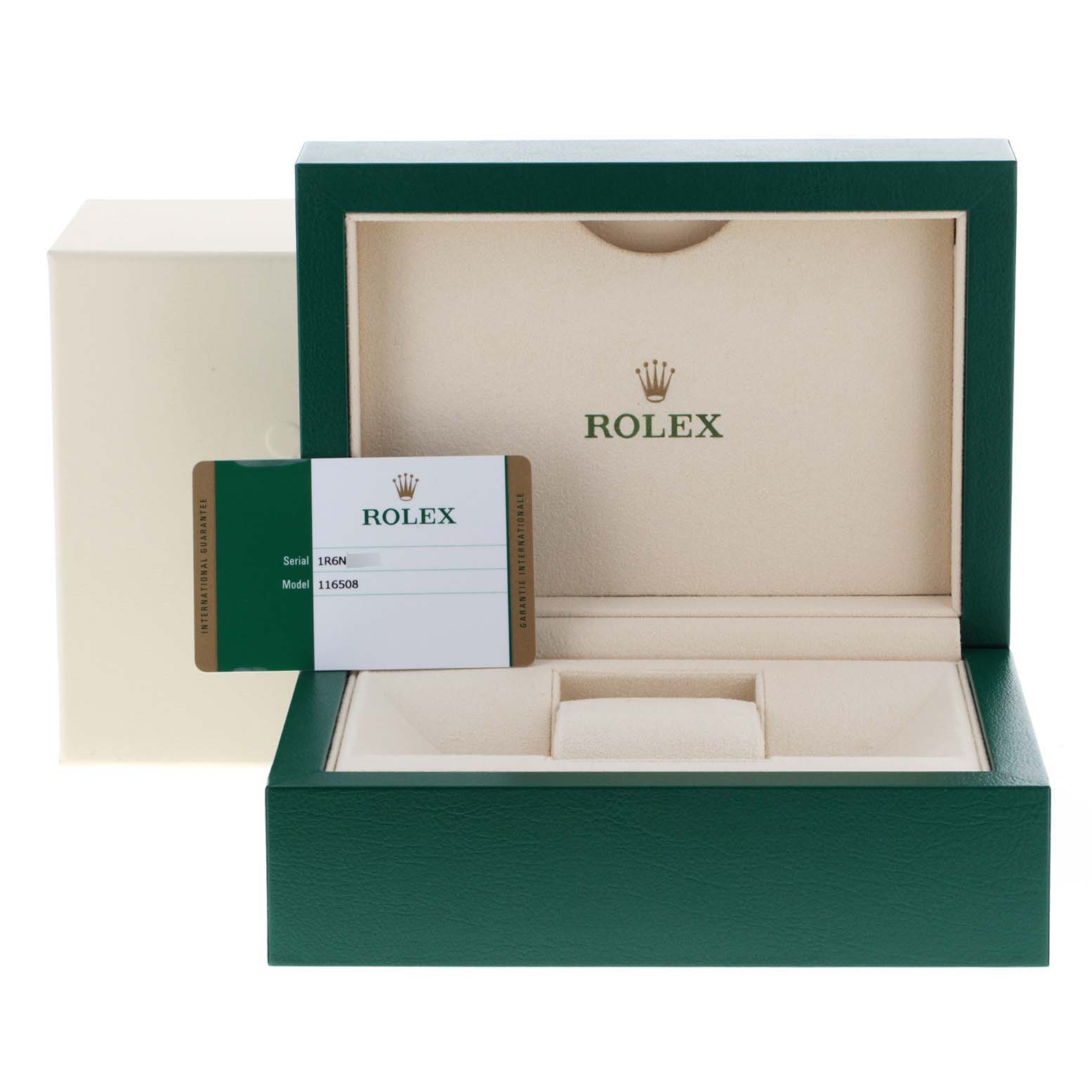 The image shows an open Rolex Daytona 116508 Men's Yellow Gold Green Dial 116508 Men's Yellow Gold Green Dial watch box, displaying the interior and a warranty card.