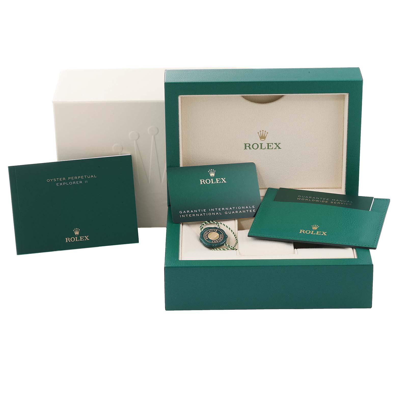 The image shows a Rolex Explorer 226570 Men's Stainless Steel Black Dial 226570 Men's Stainless Steel Black Dial watch box set with manuals, a guarantee card, and a tag from an overhead angle.