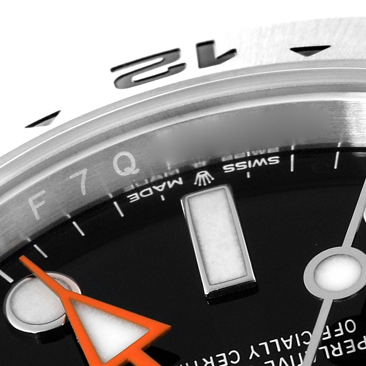 The image shows a close-up of the dial and bezel of a Rolex Explorer 226570 Men's Stainless Steel Black Dial 226570 Men's Stainless Steel Black Dial watch, focusing on the hour markers and an orange second hand.
