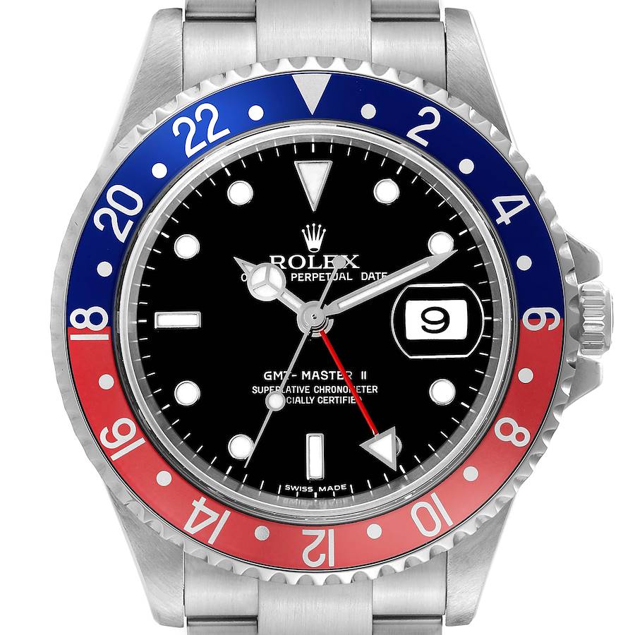 The Rolex GMT-Master model is shown from a top-down angle, highlighting the bezel, dial, and part of the bracelet.