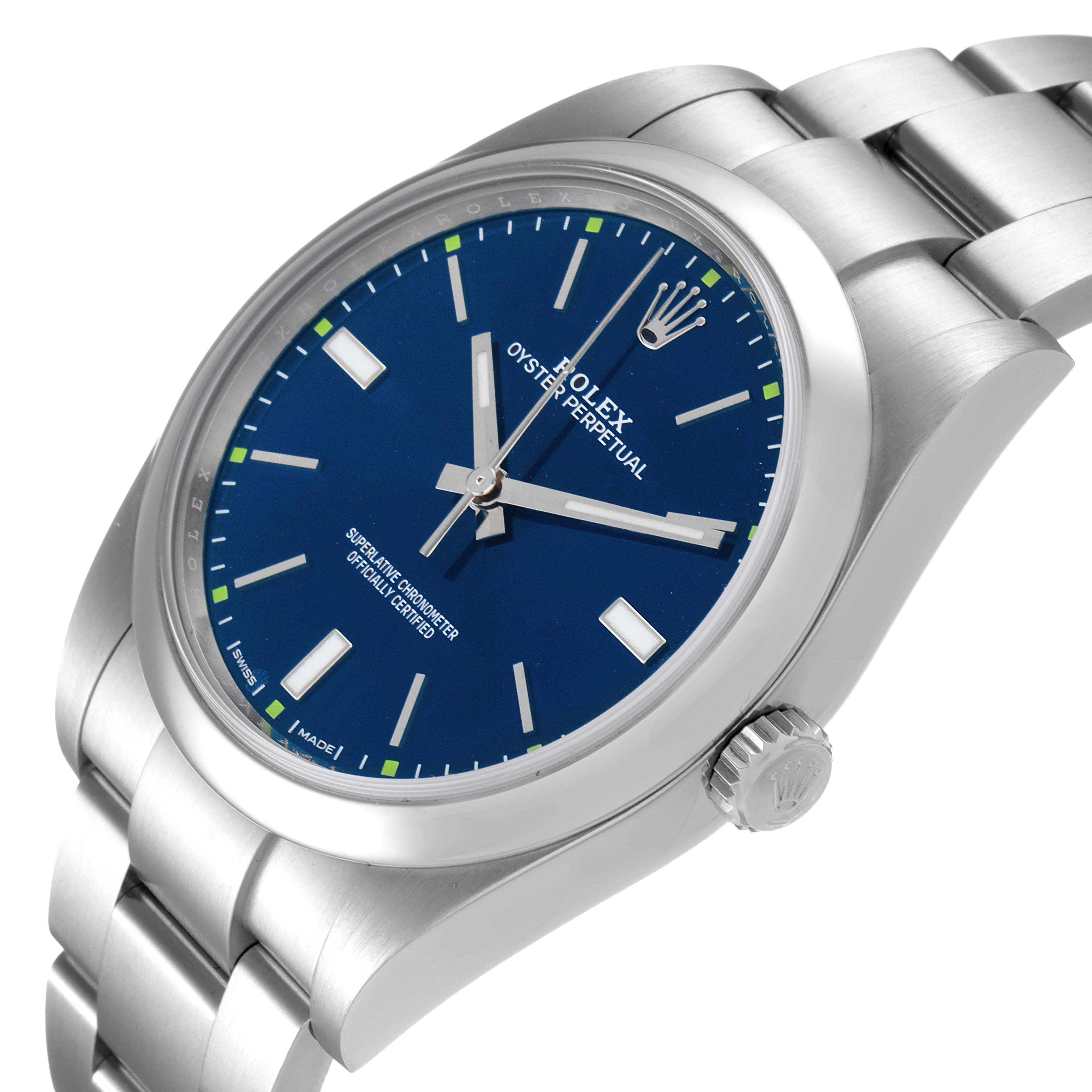 This is a side-angle view of a Rolex Oyster Perpetual 114300 Men
s Stainless Steel Blue Dial 114300 Men
s Stainless Steel Blue Dial watch featuring the dial, bezel, crown, and part of the bracelet. 