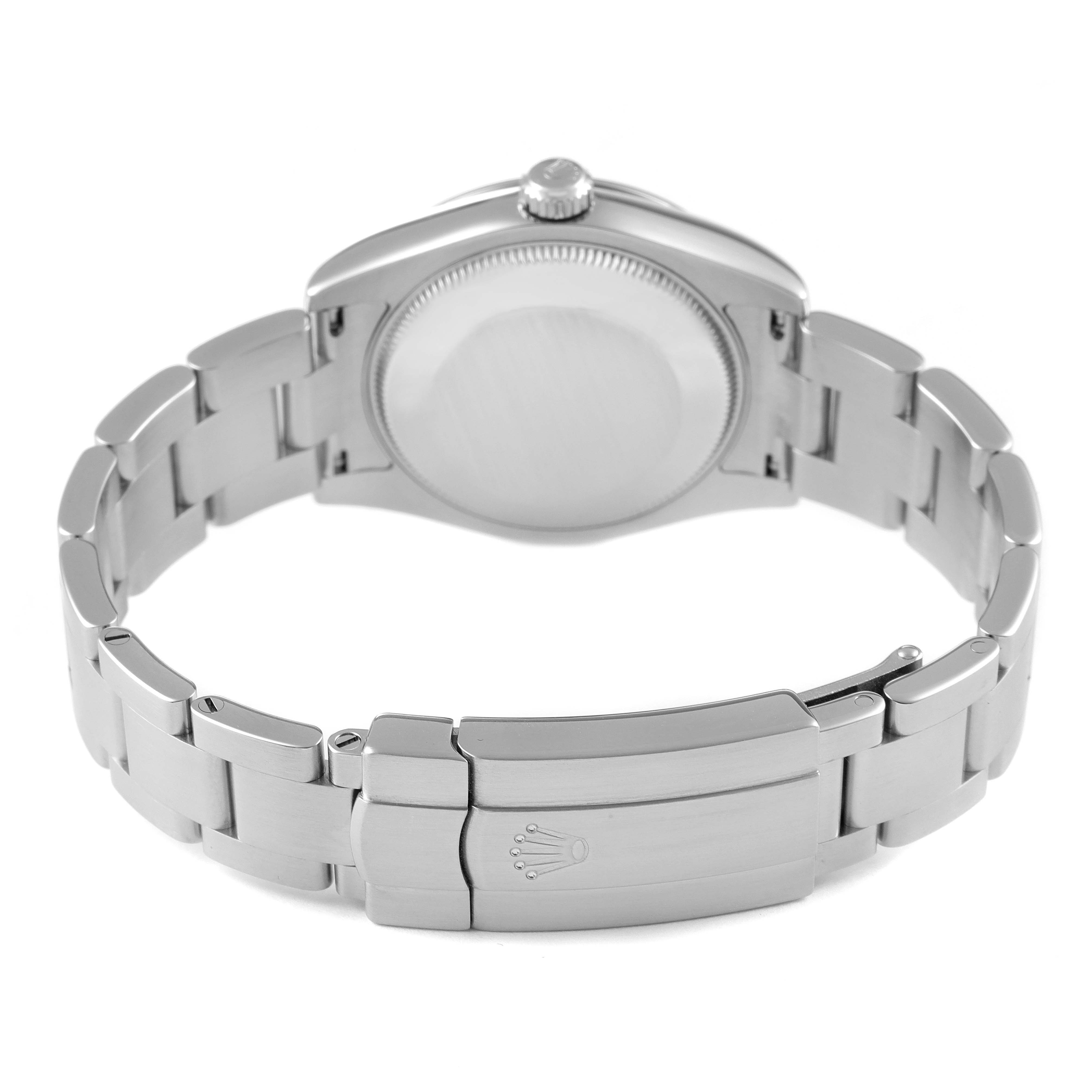 This image shows the underside of a Mid-Size Rolex watch, focusing on the bracelet and closed clasp.