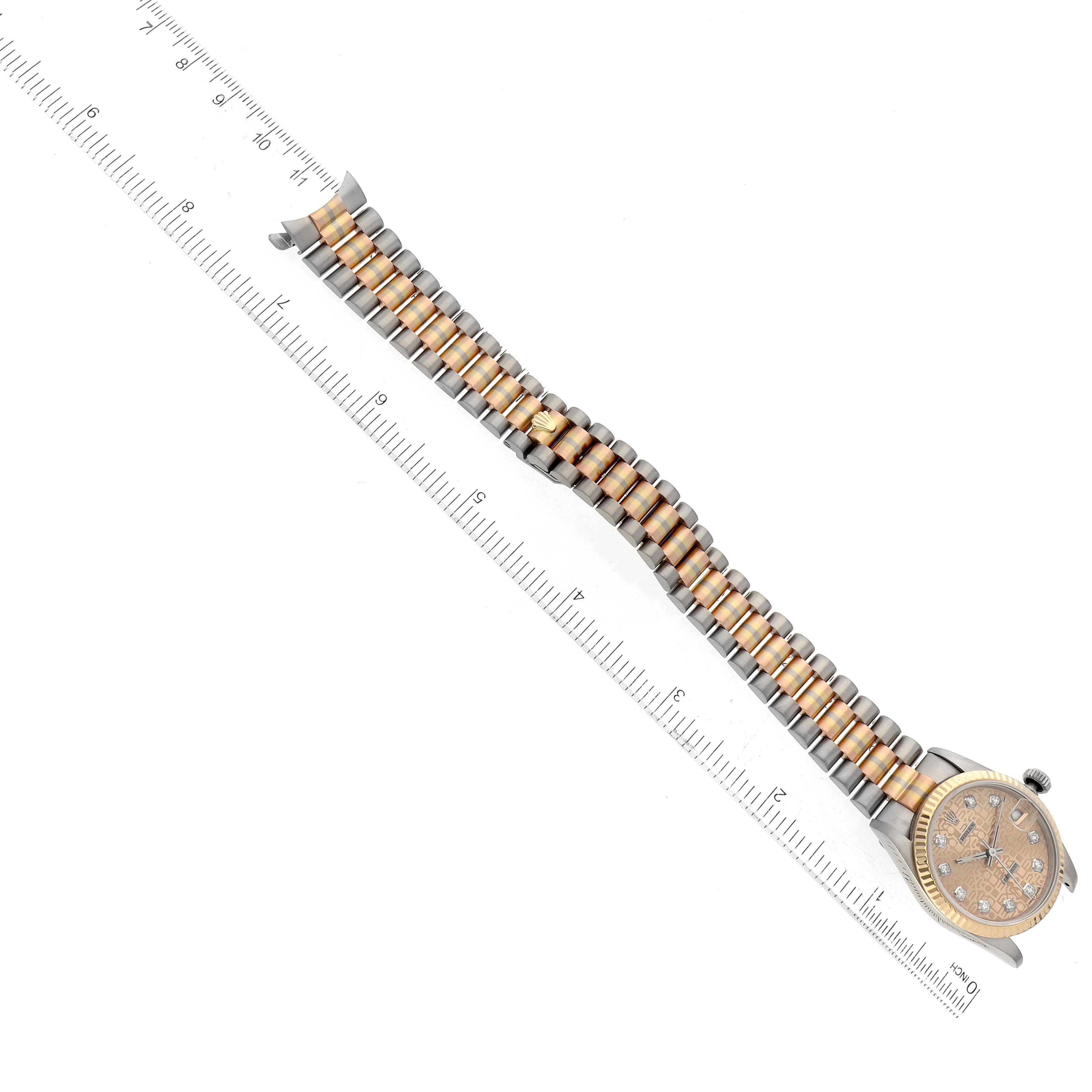 This image shows the Rolex President 68279 Women's White Gold Champagne Dial 68279 Women's White Gold Champagne Dial model watch from a top-down angle, emphasizing the bracelet and part of the watch face.