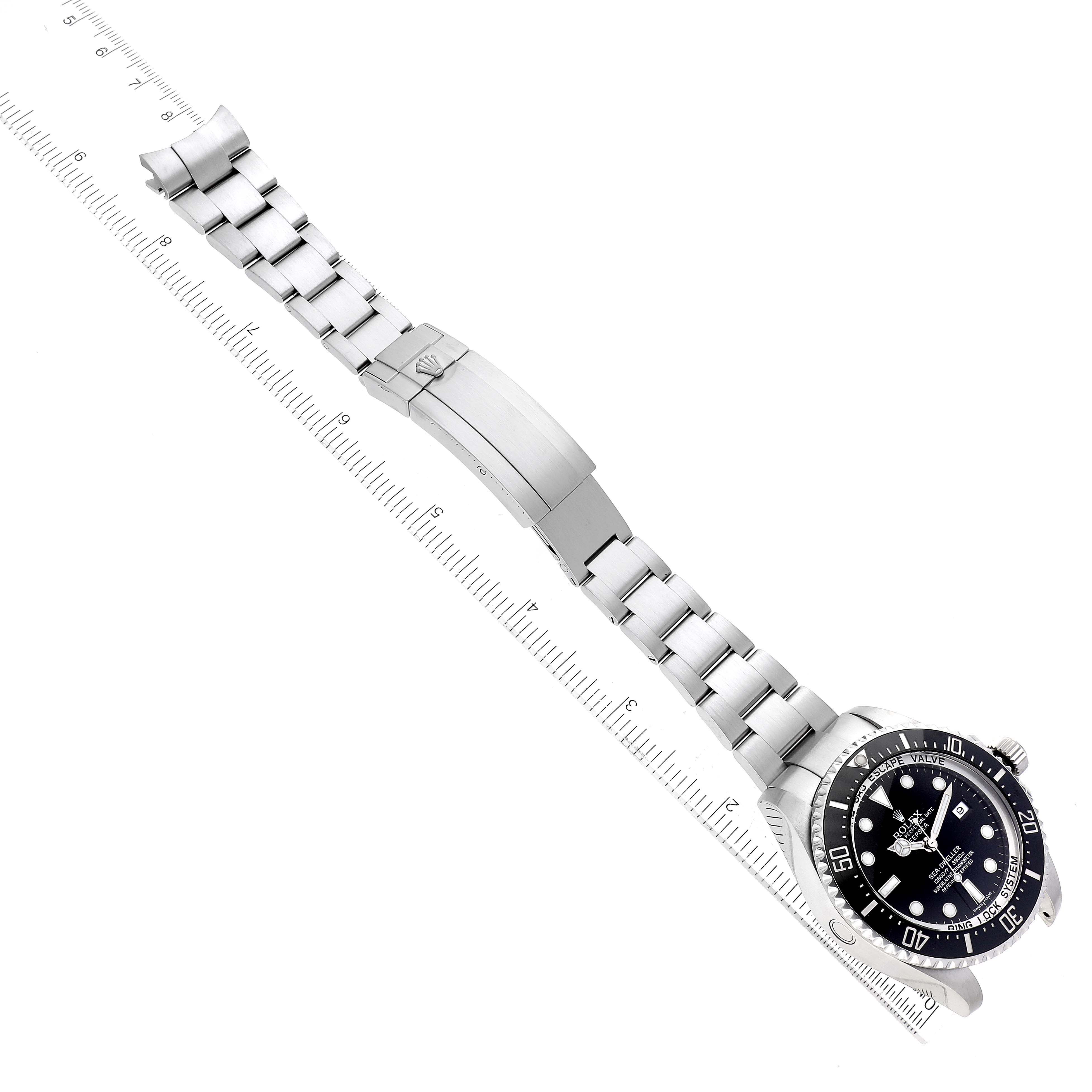 The image shows a top view of a Rolex Sea-Dweller 116660 Men
s Stainless Steel Black Dial 116660 Men
s Stainless Steel Black Dial watch, displaying the full band, including the clasp and face.