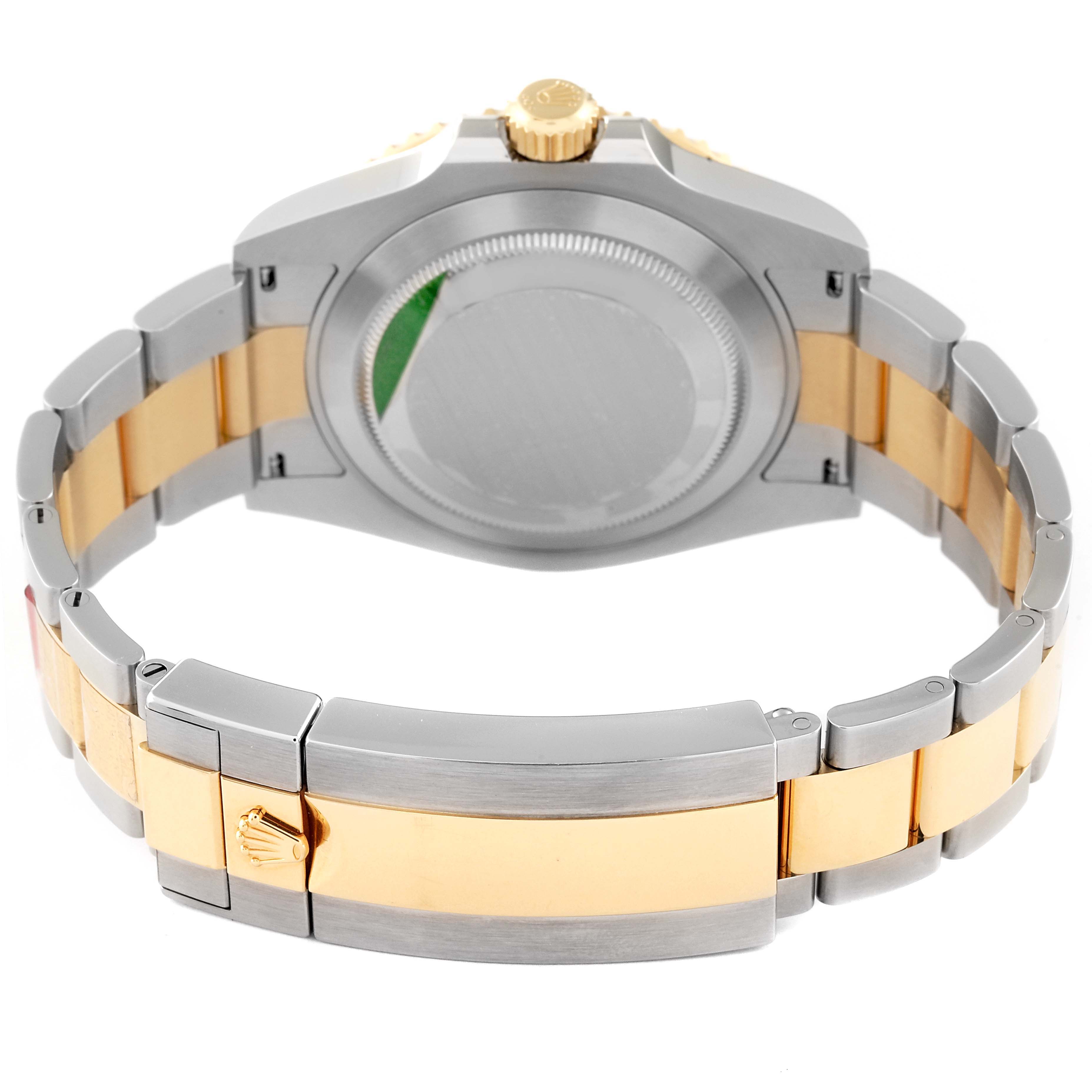 This image shows the back case and clasp of a Rolex Submariner 126613 Men's Steel and Gold (two tone) Black Dial 126613 Men's Steel and Gold (two tone) Black Dial watch from a rear angle.