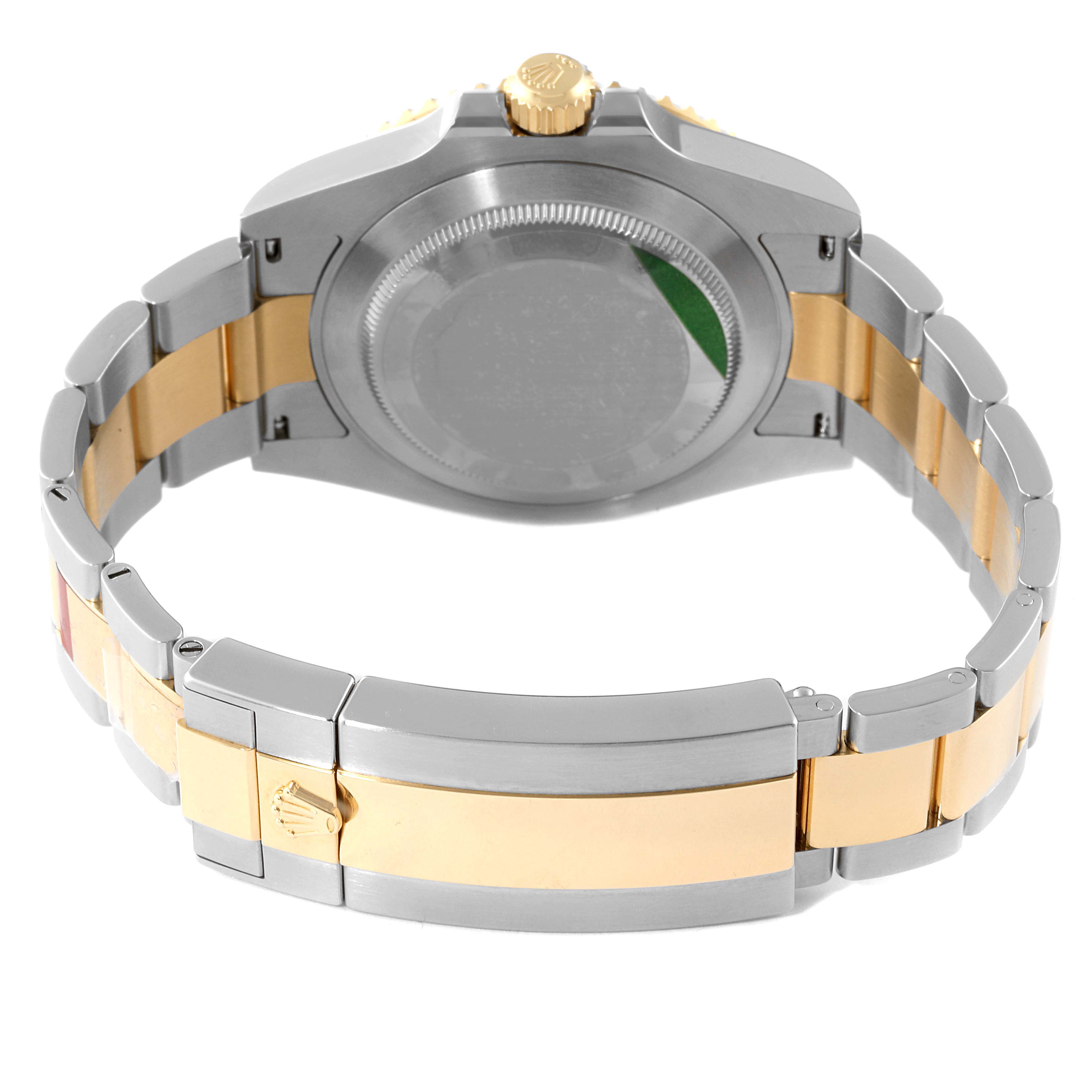 This image shows the back view of a Rolex Submariner 126613 Men's Steel and Gold (two tone) Black Dial 126613 Men's Steel and Gold (two tone) Black Dial watch, focused on the clasp and bracelet.