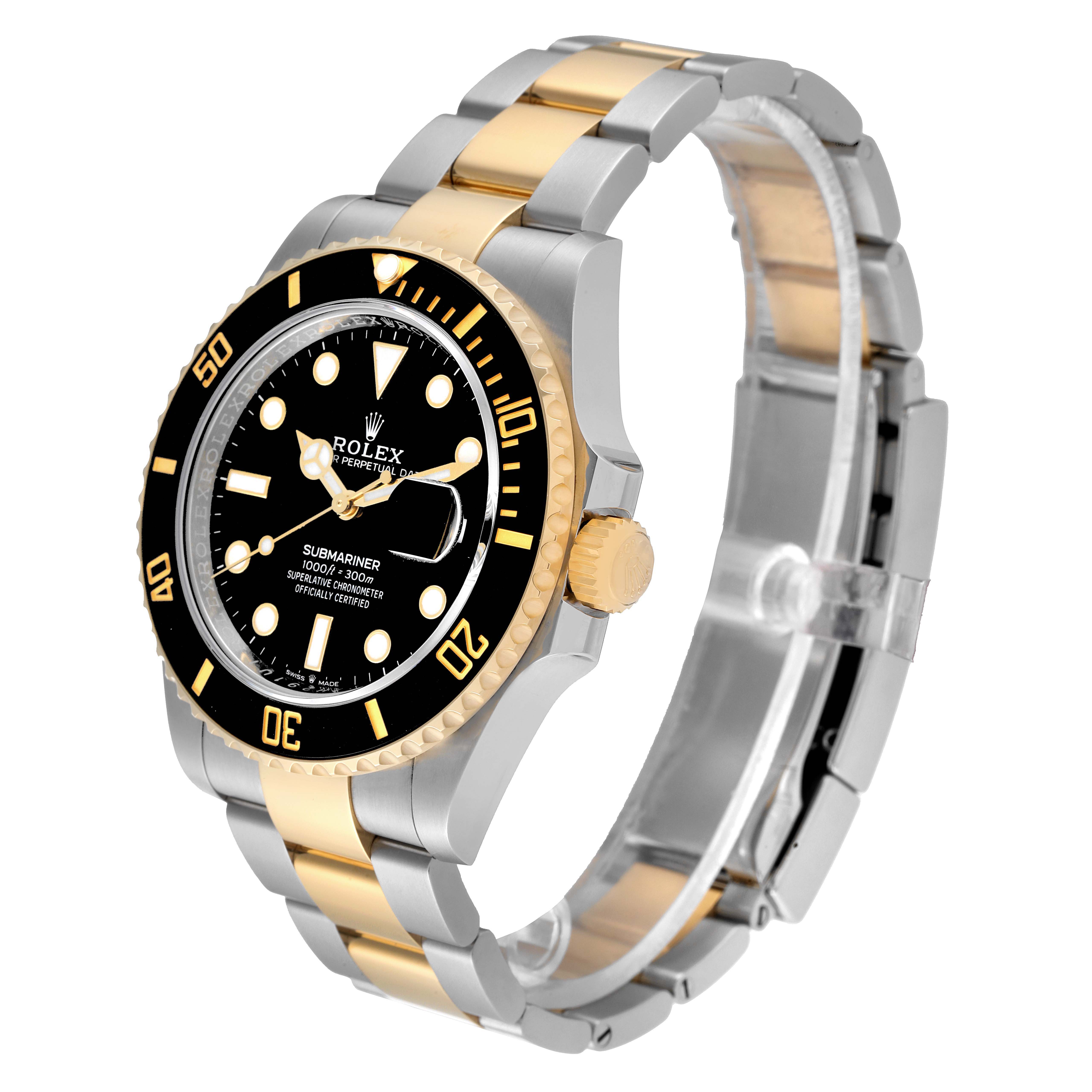 The Rolex Submariner 126613 Men's Steel and Gold (two tone) Black Dial 126613 Men's Steel and Gold (two tone) Black Dial watch is shown at a slight angle, highlighting its black dial, bezel, two-tone bracelet, and crown.