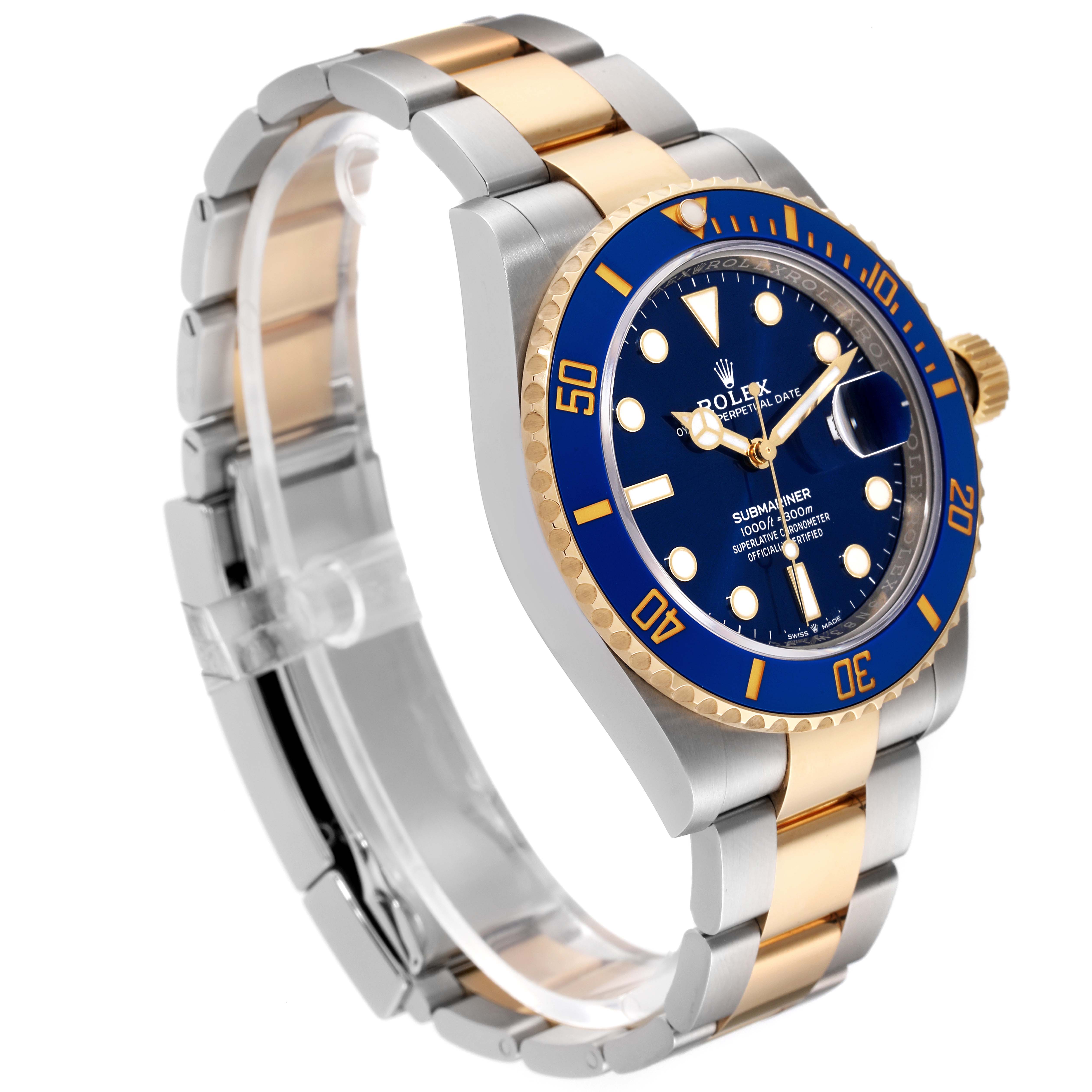 The image shows a side angle of a Rolex Submariner 126613 Men's Steel and Gold (two tone) Blue Dial 126613 Men's Steel and Gold (two tone) Blue Dial watch, highlighting its blue dial, bezel, and two-tone bracelet.