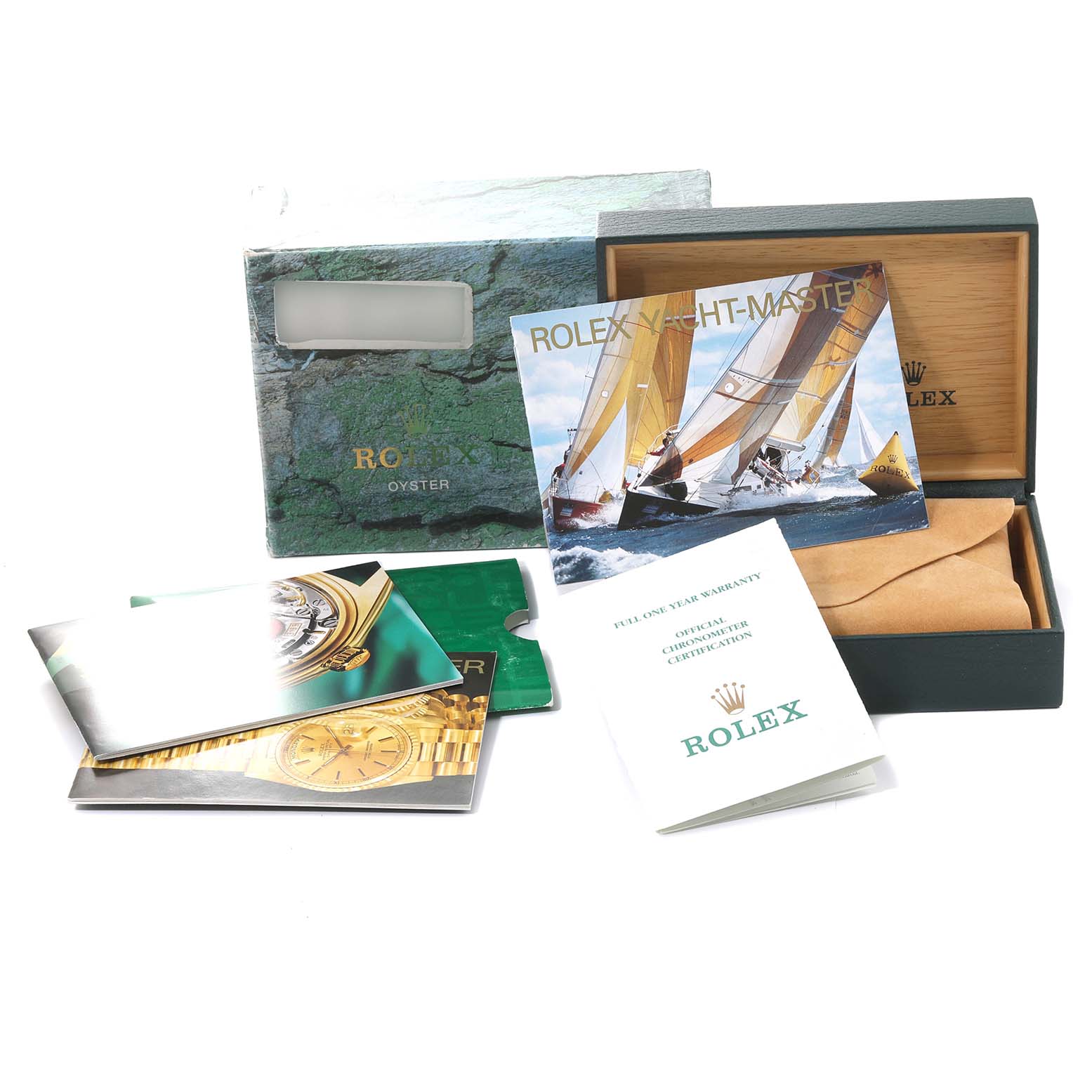 The image shows the packaging, booklets, and certificates for the Rolex Yacht-Master 69623 Women's Steel and Gold (two tone) White Dial 69623 Women's Steel and Gold (two tone) White Dial model watch.
