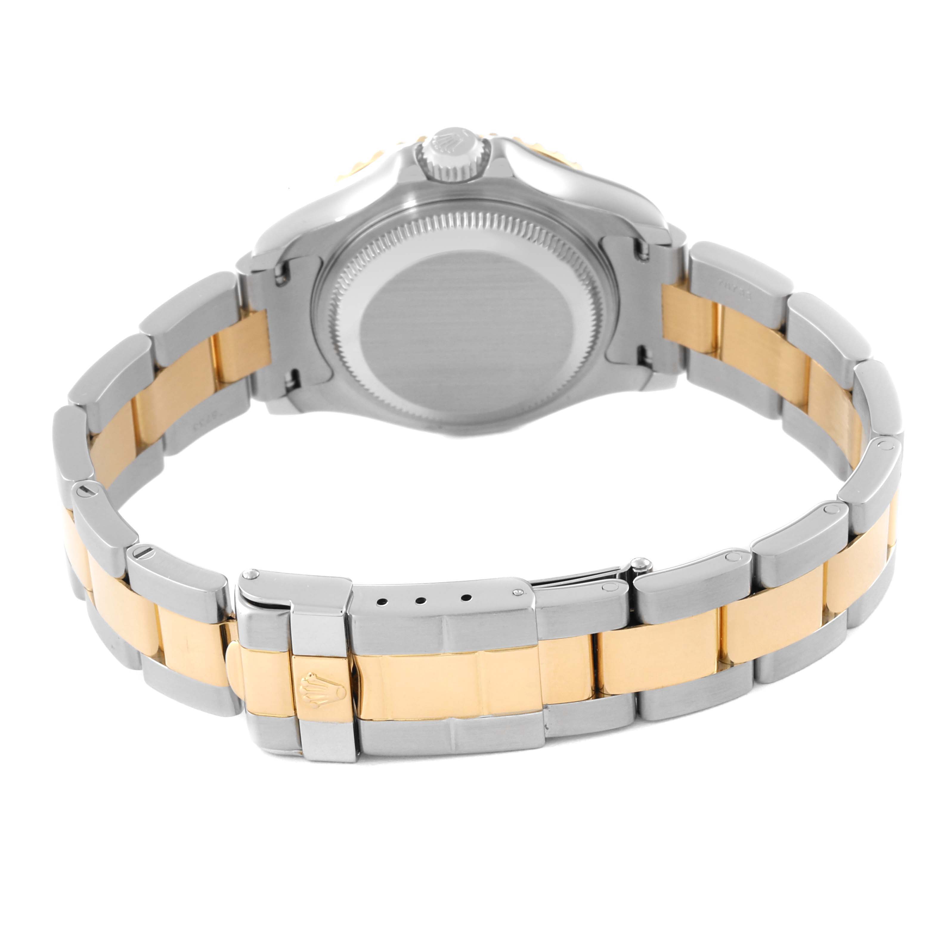 This image shows the rear view of the Rolex Yacht-Master 69623 Women's Steel and Gold (two tone) White Dial 69623 Women's Steel and Gold (two tone) White Dial watch, focusing on the case back, crown, and bi-metal bracelet.