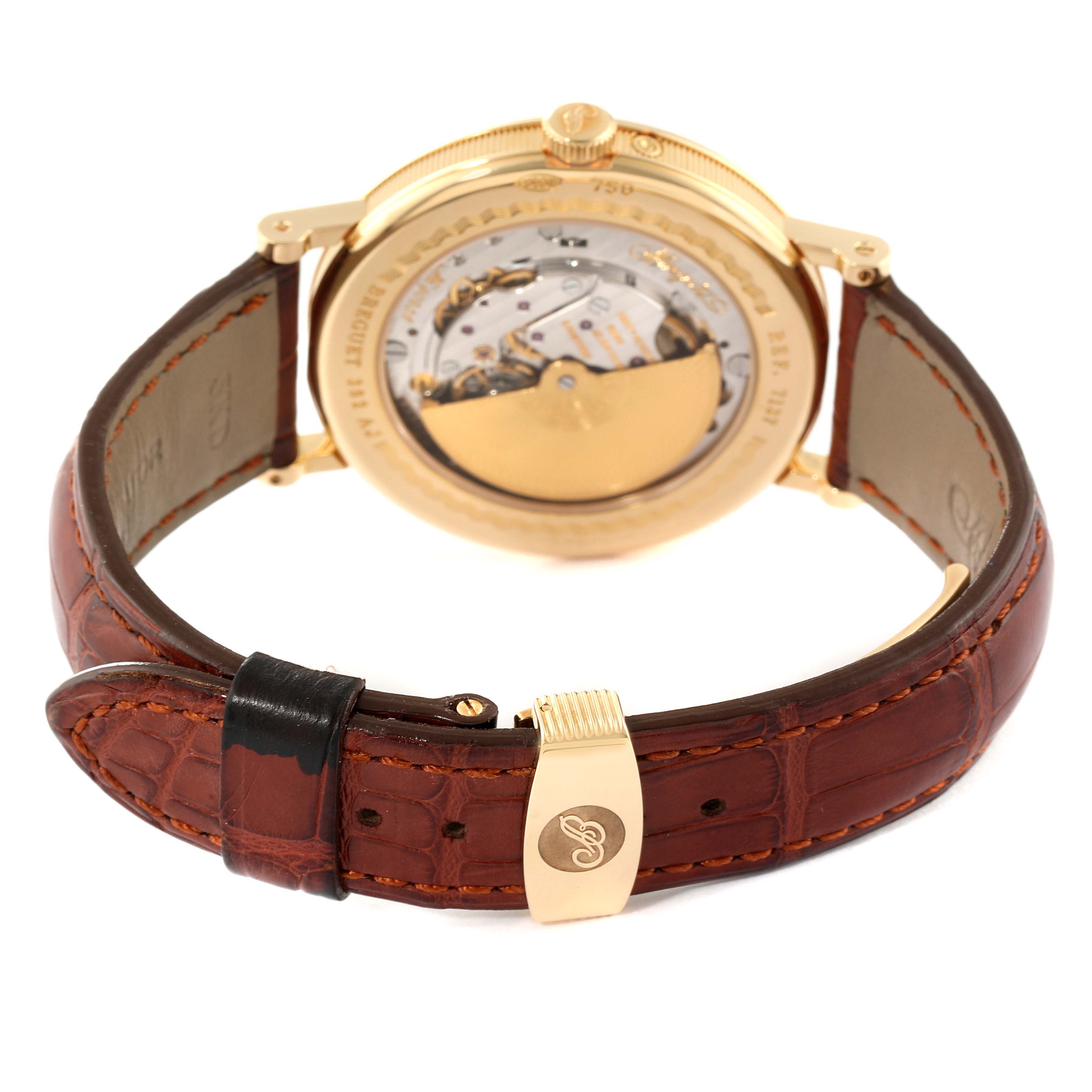 The image shows the back view of the Breguet Classique 7137BA/11/9V6 Men
s Yellow Gold Silver Dial 7137BA/11/9V6 Men
s Yellow Gold Silver Dial watch, displaying its leather strap and exposed movement.