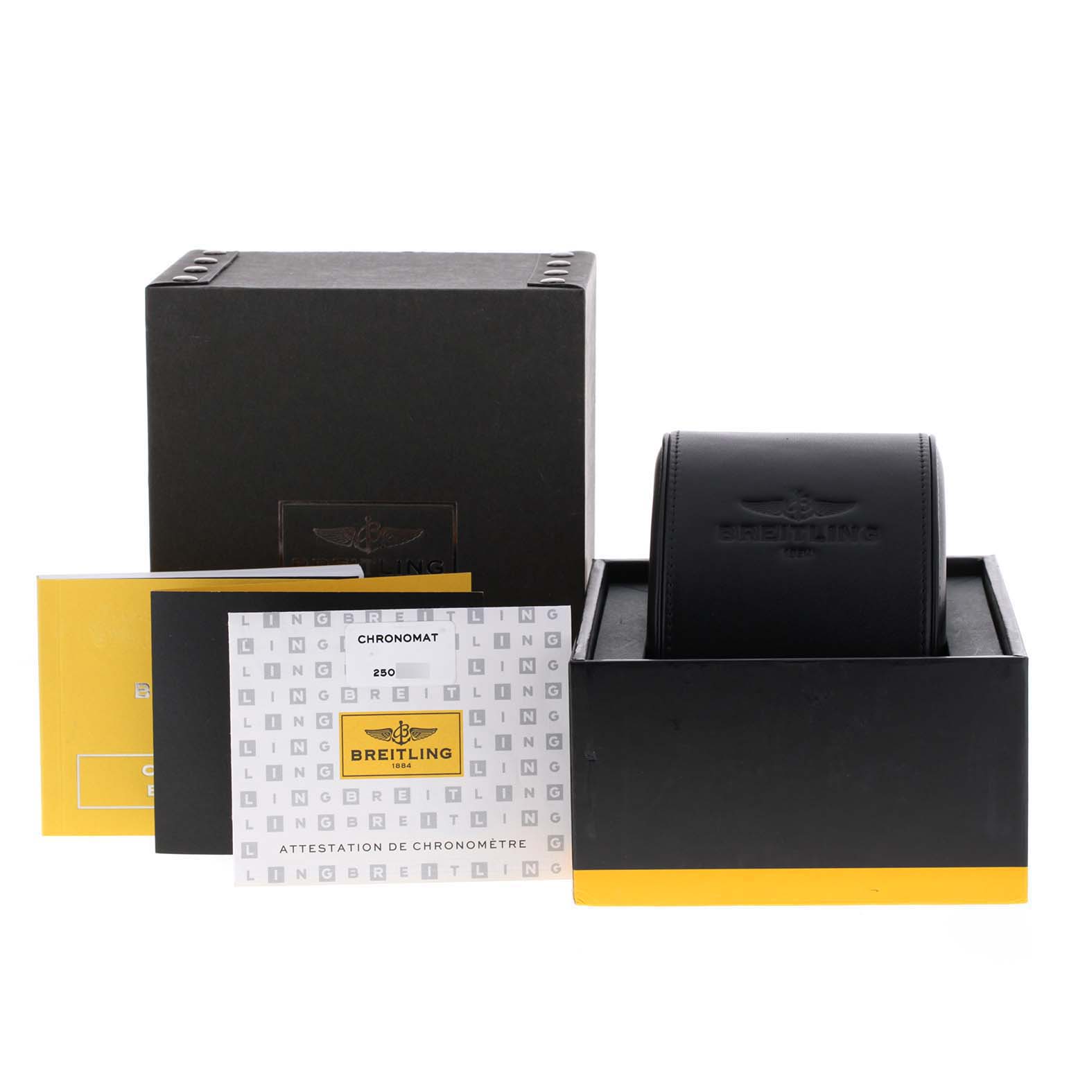 The image shows the packaging, documentation, and watch holder for the Breitling Chronomat A44360 Men
s Stainless Steel Black Dial A44360 Men
s Stainless Steel Black Dial model.