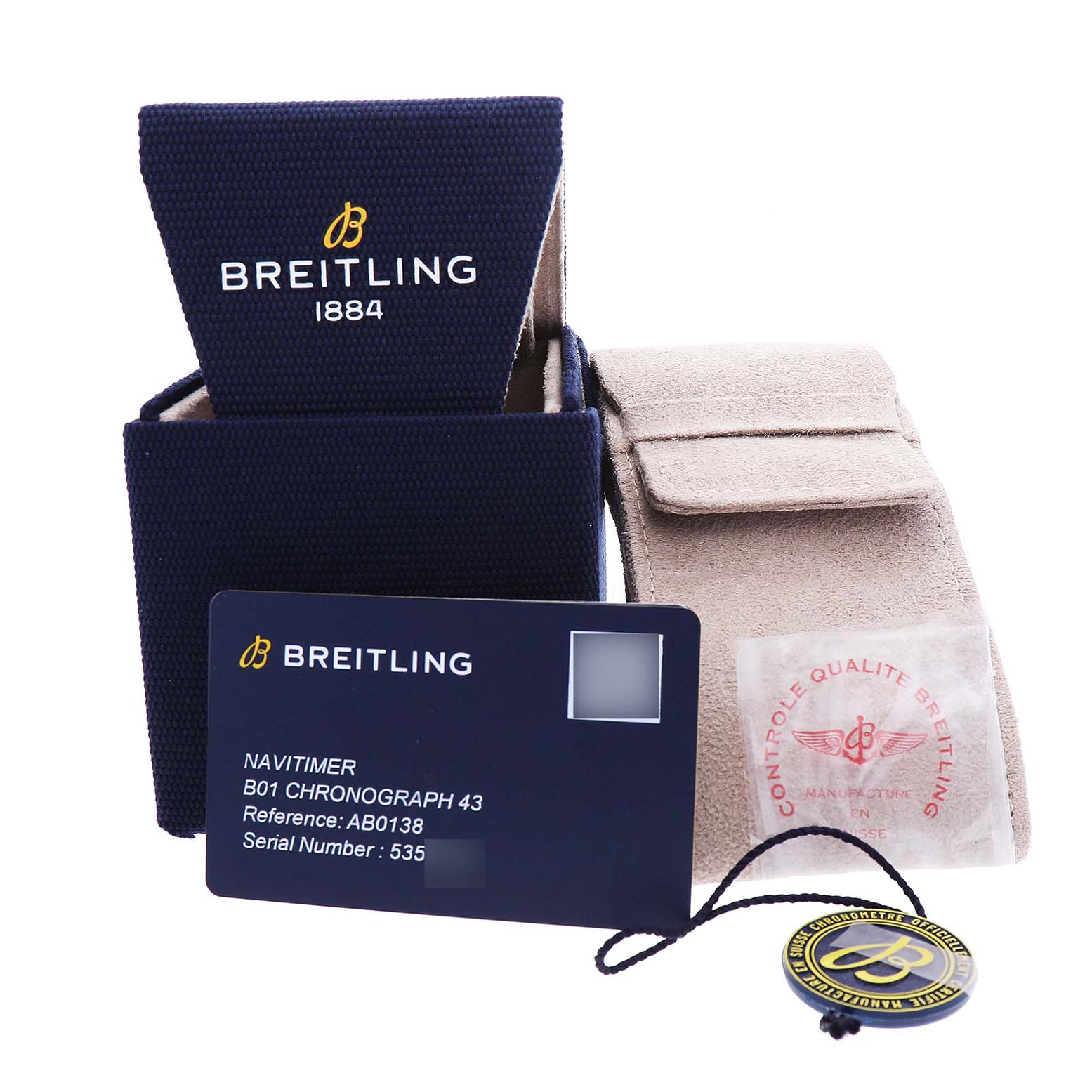 This image shows the packaging and accessories for a Breitling Navitimer AB0138 Men's Stainless Steel Blue Dial, including a box, pouch, card, and tag.