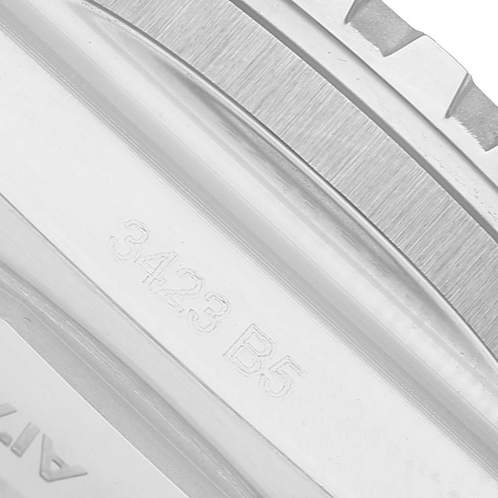 The image shows a close-up side view of a Breitling Superocean A17378 Men's Stainless Steel Blue Dial watch bezel with engraved markings.