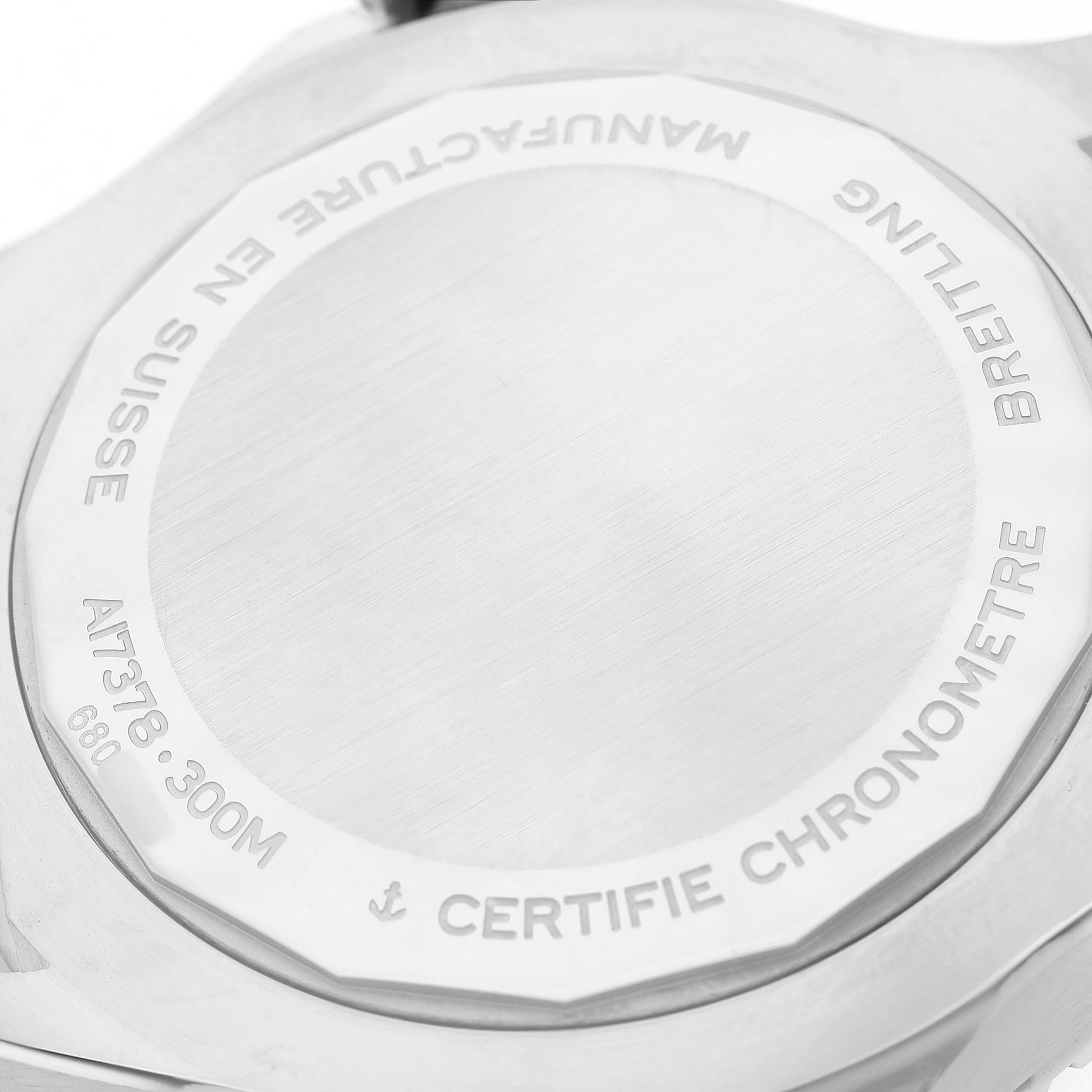 The image shows the case back of a Breitling Superocean A17378 Men's Stainless Steel Blue Dial watch, displaying engravings and specifications.