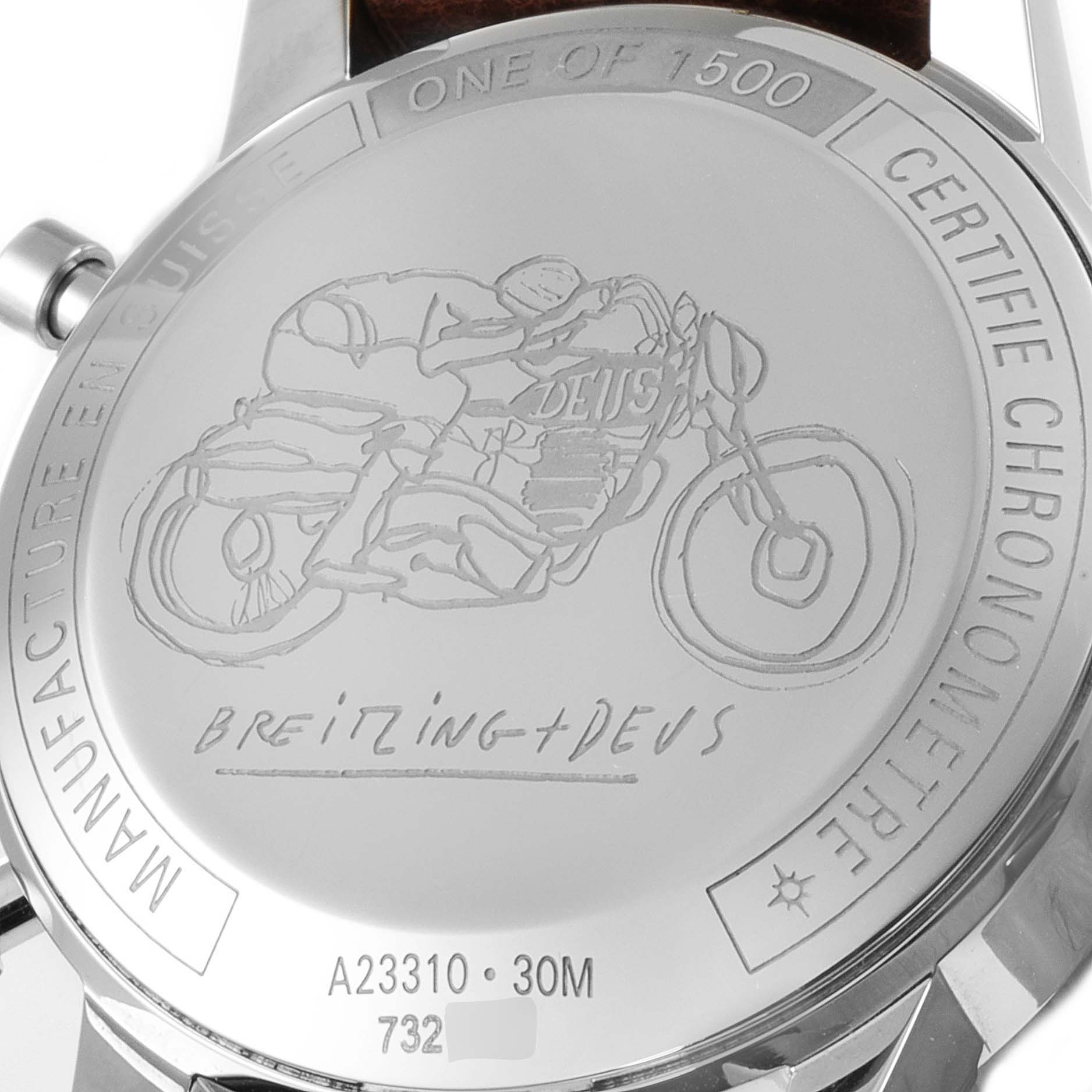 The image shows the back casing of a Breitling Professional Series A23310.121.G1X1 Men's Stainless Steel White Dial A23310.121.G1X1 Men's Stainless Steel White Dial watch, featuring an engraved motorcycle design and various inscriptions.
