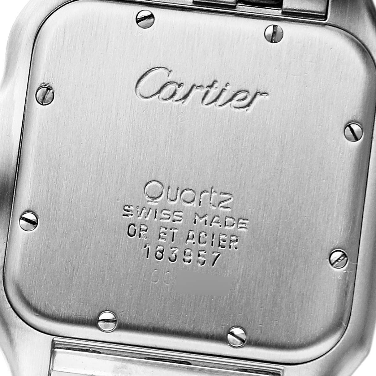 This image shows the back case of a Cartier Panthere 187957 Women's Steel and Gold (two tone) Silver Dial 187957 Women's Steel and Gold (two tone) Silver Dial watch, displaying the brand name, model details, and serial number.