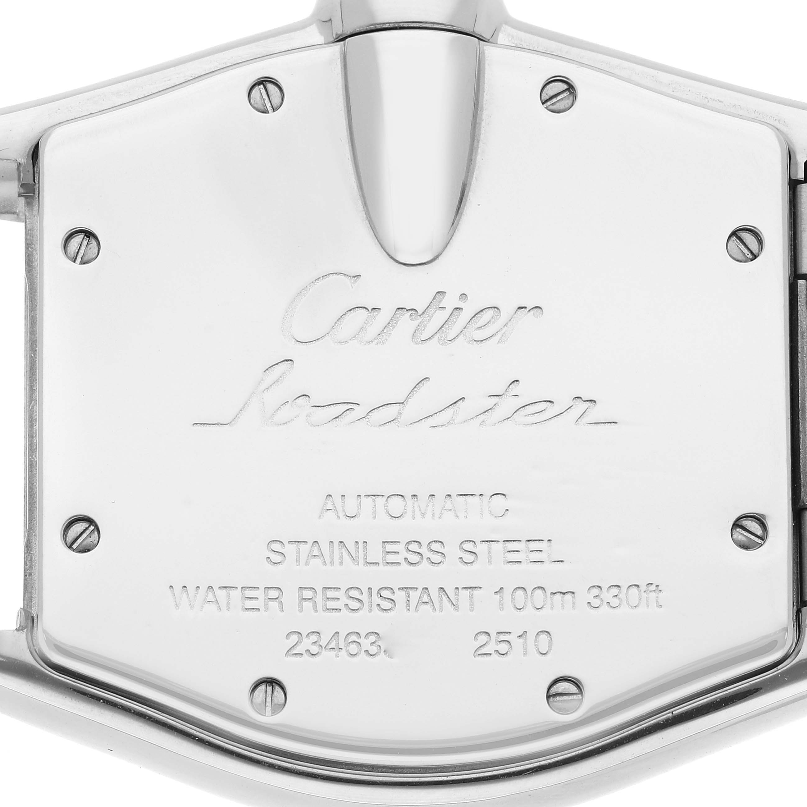 This image shows the back case of the Cartier Roadster W62031Y4 Men
s Steel and Gold (two tone) Silver Dial W62031Y4 Men
s Steel and Gold (two tone) Silver Dial watch, featuring engraved details and screws.