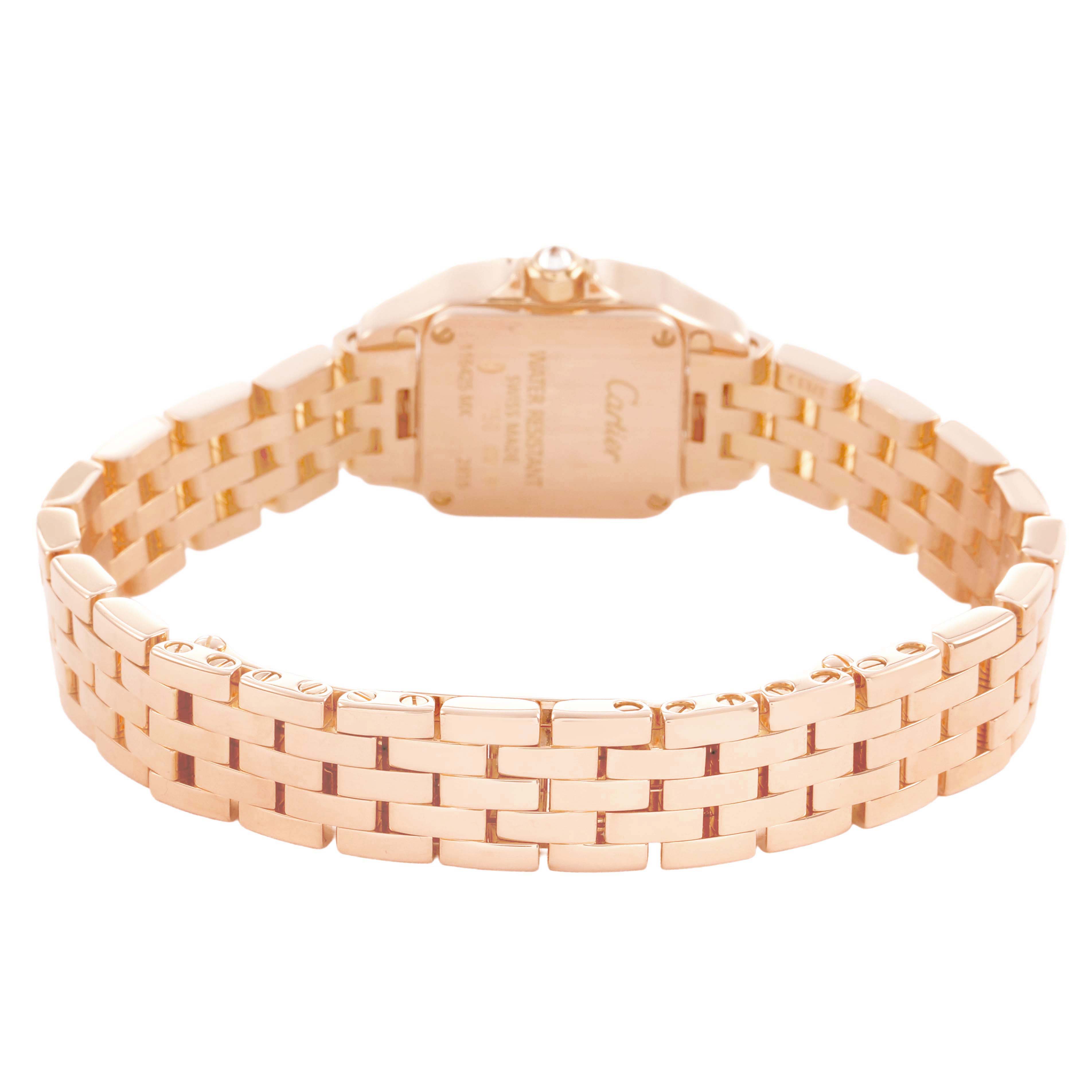 The image shows the back of a Cartier Santos WF9011Z8 Women's Rose Gold Silver Dial watch, highlighting its gold bracelet and case from a rear angle.