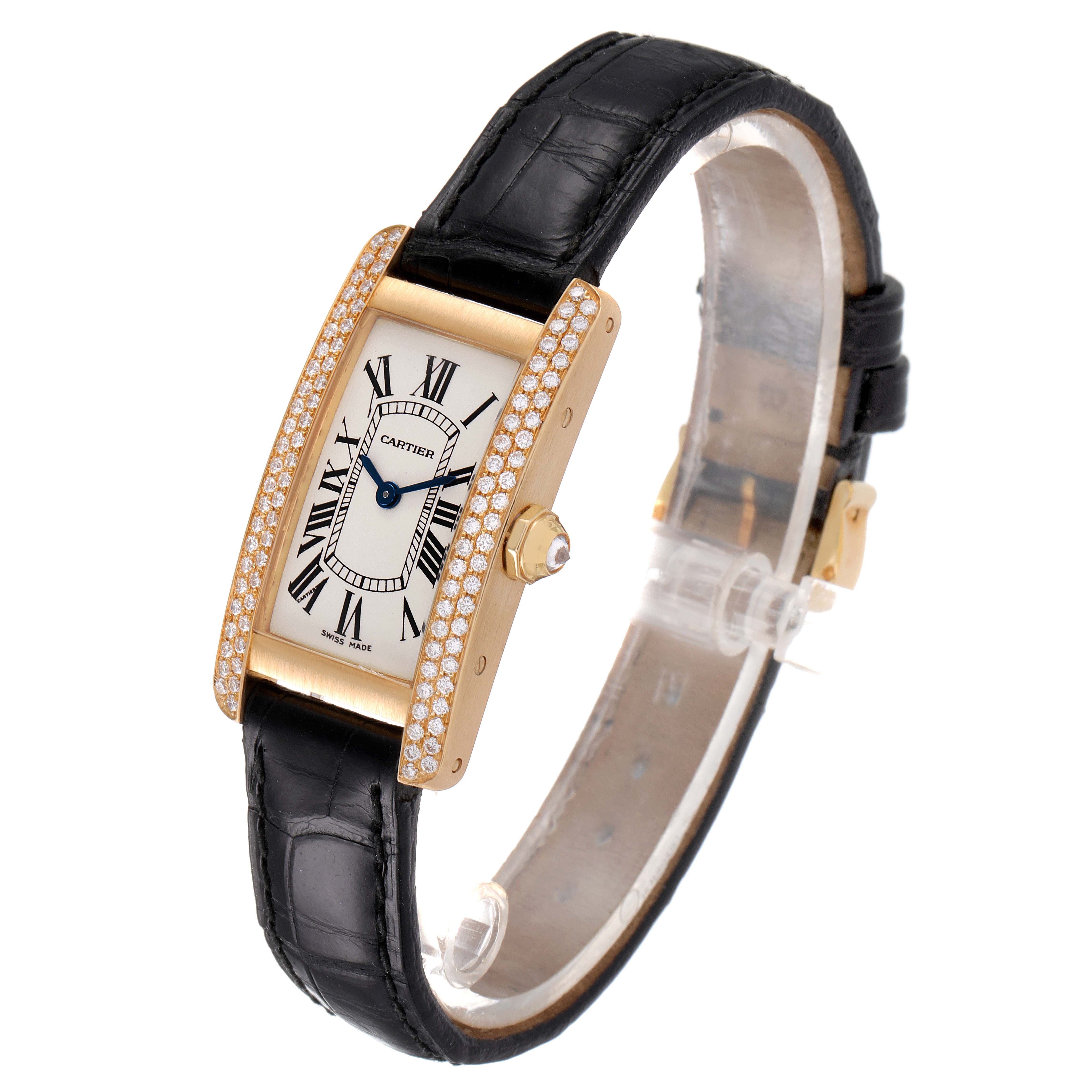 The Cartier Tank Americaine WB701251 Women's Yellow Gold Silver Dial WB701251 Women's Yellow Gold Silver Dial watch is shown from an angled top-down view, highlighting its dial, leather strap, and diamond-set bezel.